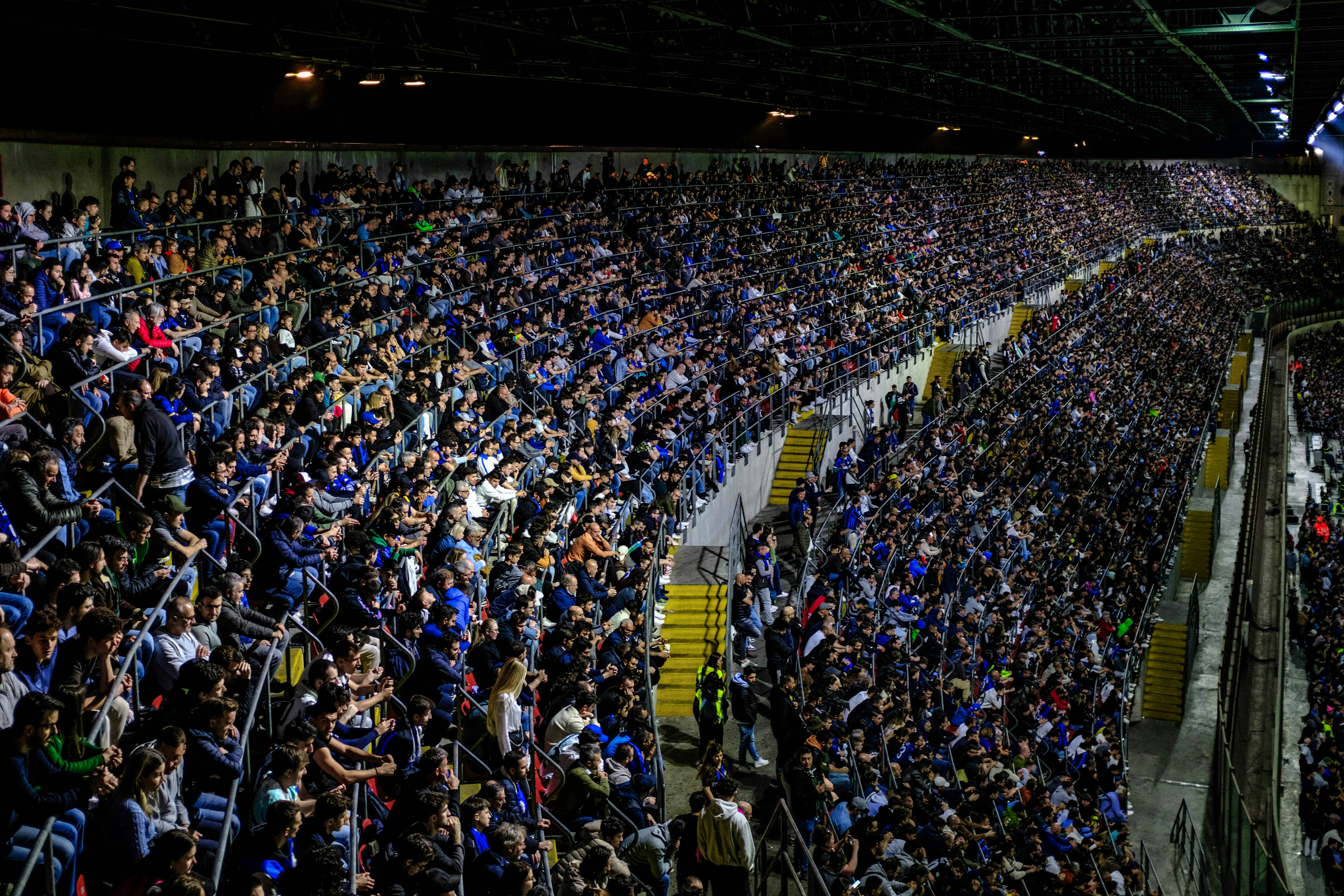 a large crowd of people in a stadium