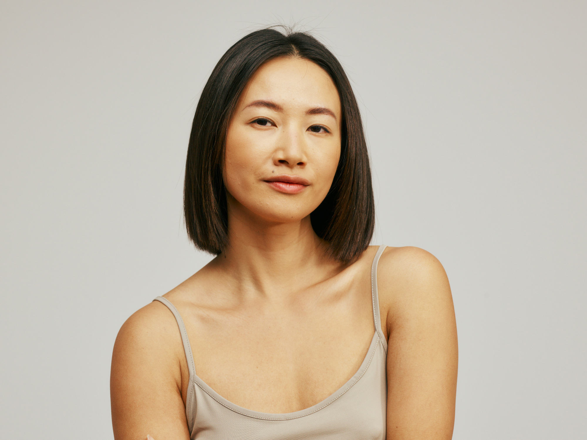 An asian woman posing for the camera