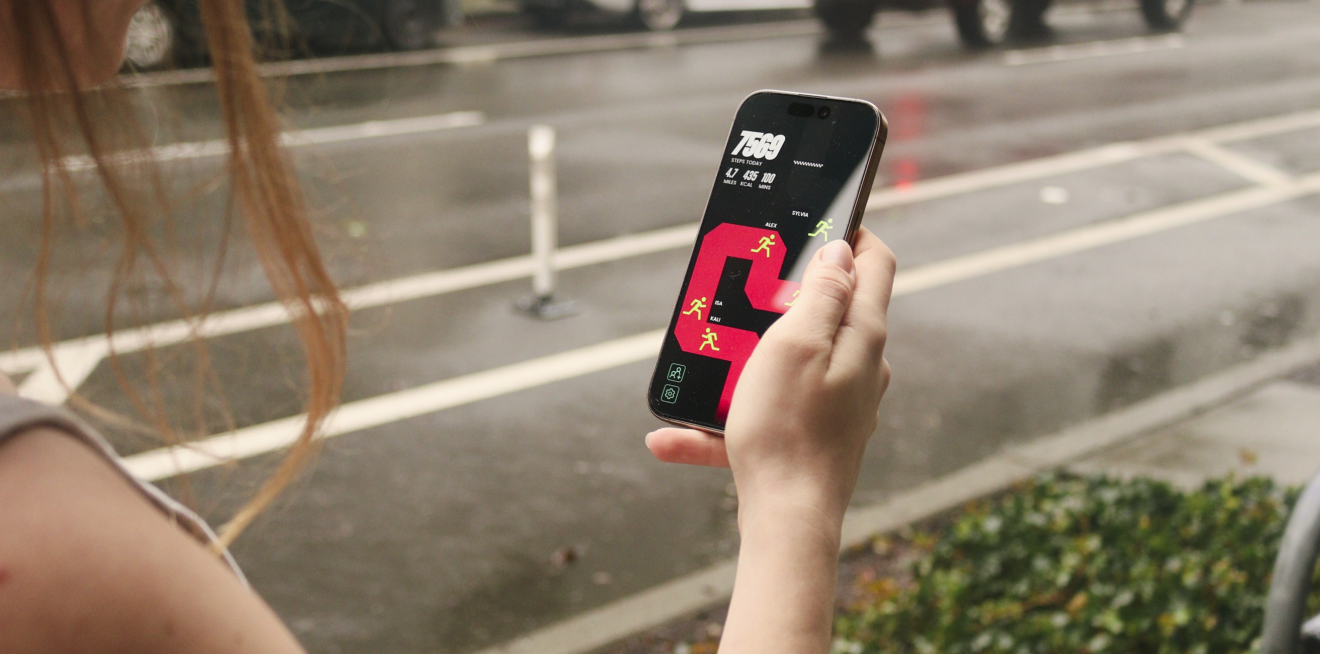 White branded cap with turquoise logo placed on fresh lemons in a red bowl