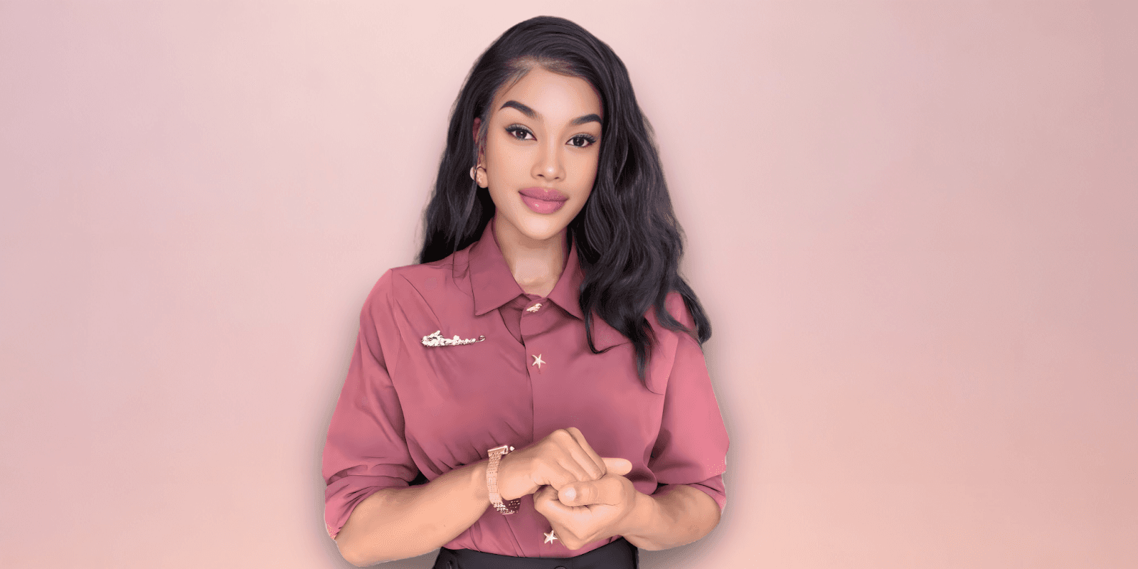 A woman in a pink shirt holds her hands together, symbolizing faith and unity within the World Change Five Fold Ministries.