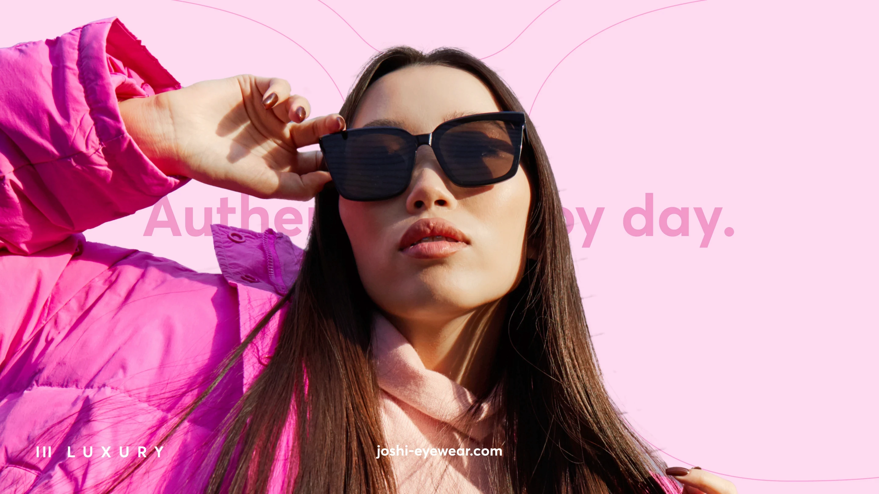 Woman wearing sunglasses and pink jacket