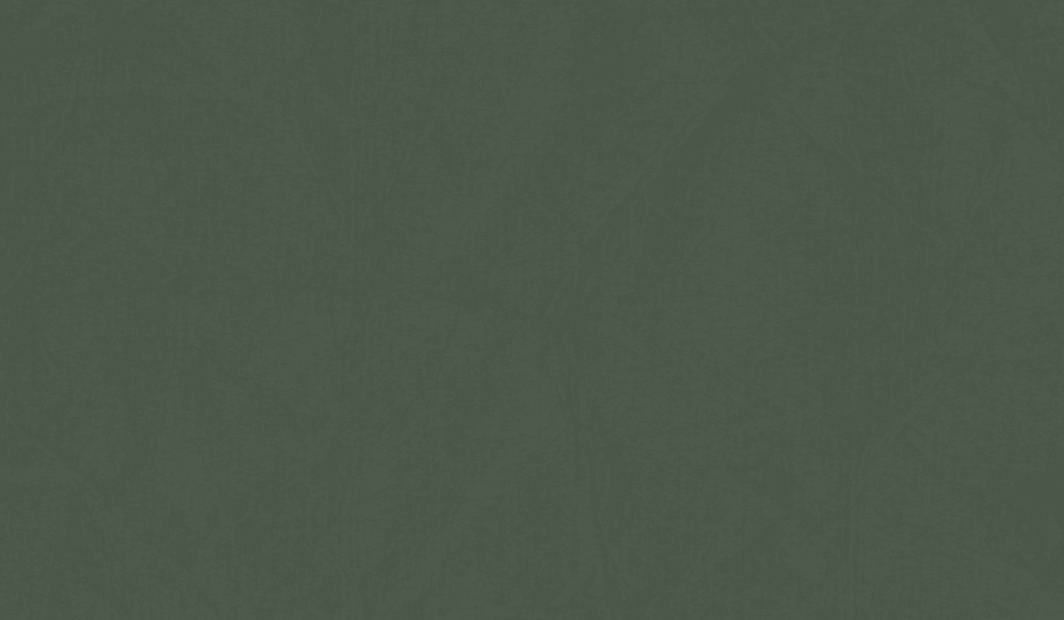 a couple of bottles sitting on top of a wooden table