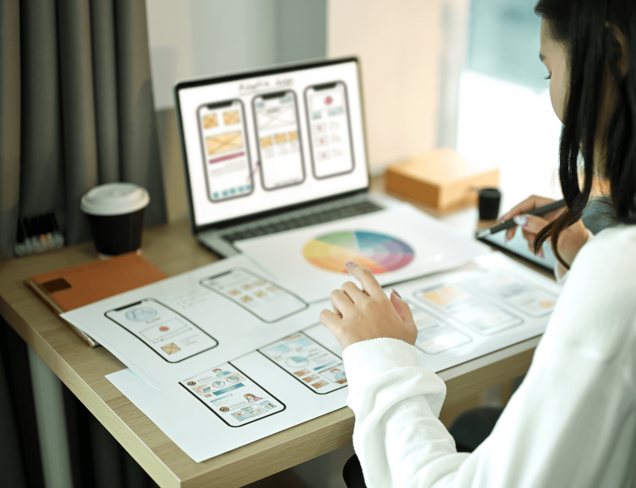 Image of a designer working on his computer