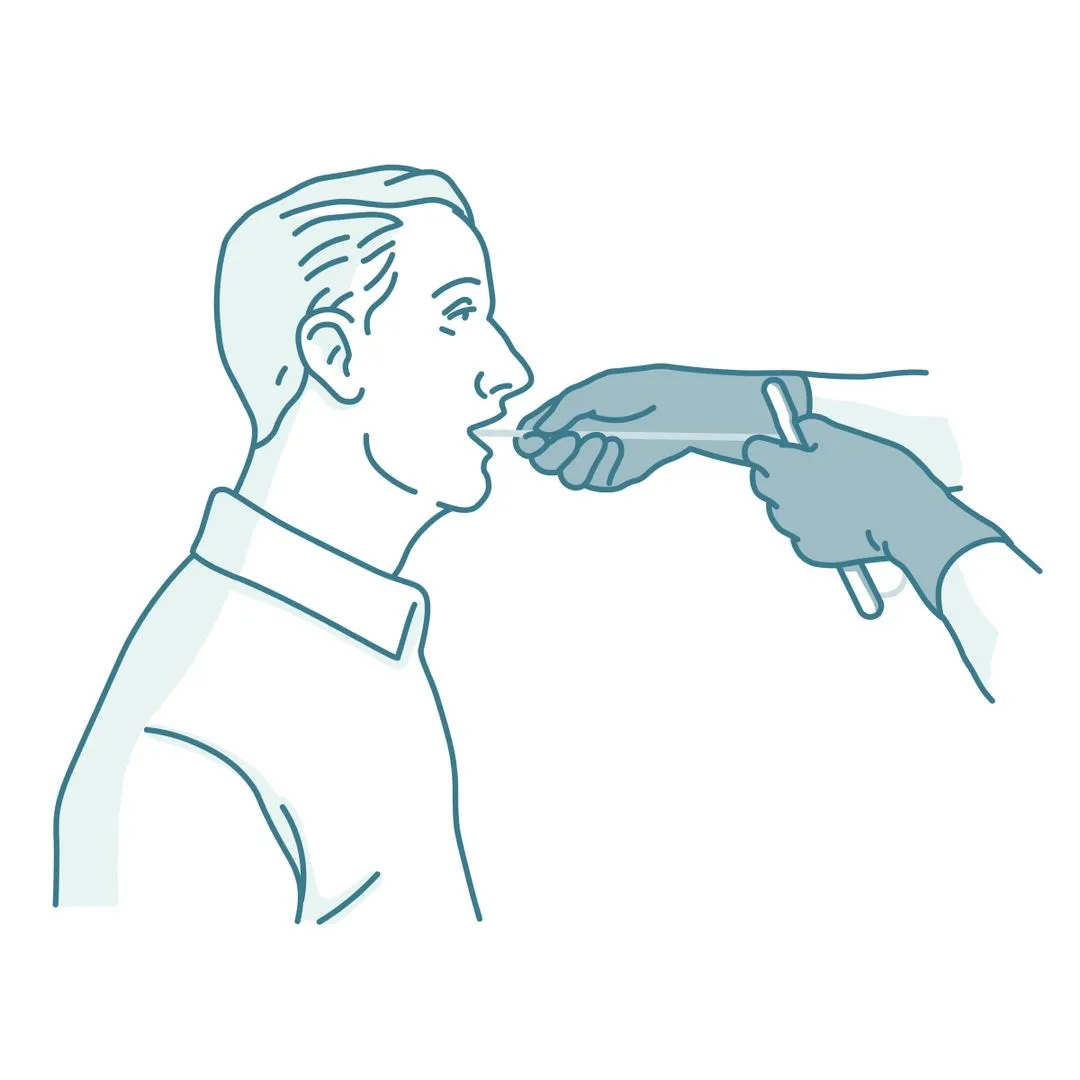 person holding pencil near laptop computer