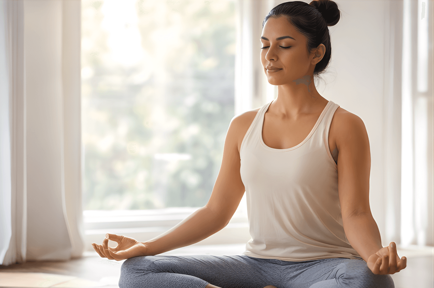woman in black tank top sitting on brown wooden dock during daytime