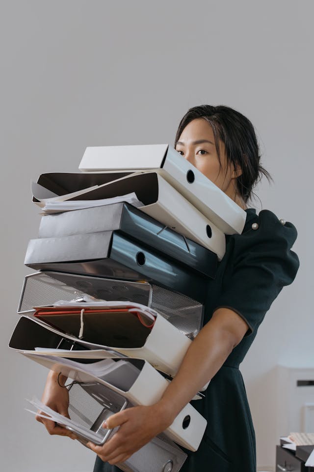 Woman carrying books