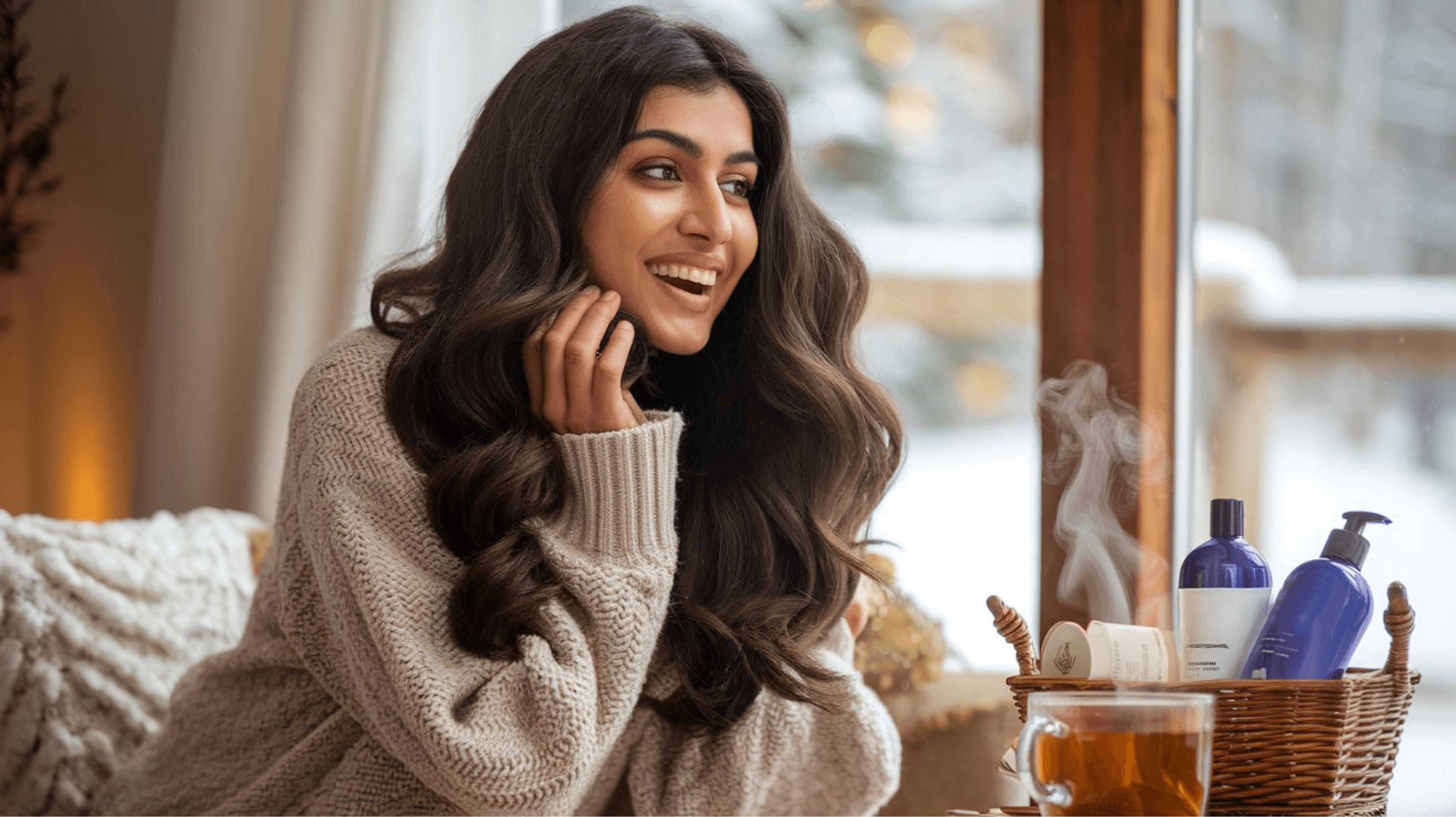 Happy woman with shiny, well-maintained hair enjoying a relaxing winter day with hair care products. hair fall control, home care, hair masks, natural remedies,  Indulekha Bringha Oil Mamaearth Onion Hair Oil Kesh King Scalp and Hair Ayurvedic Oil Biotique Bio Kelp Protein Shampoo WOW Skin Science Apple Cider Vinegar Shampoo Himalaya Herbals Anti-Hair Fall Shampoo Khadi Natural Amla & Bhringraj Shampoo Mamaearth Onion Hair Mask St. Botanica Biotin & Collagen Hair Mask WOW Skin Science Hair Mask Tresemme Keratin Smooth Conditioner Biotique Bio Watercress Fresh Nourishing Conditioner Mamaearth Argan Conditioner Himalaya Hair Zone Tablets HealthKart HK Vitals Biotin Cureveda Grow Plant-Based Biotin The Moms Co. Natural Protein Hair Oil Parachute Advanced Ayurvedic Hot Oil Soulflower Cold-Pressed Castor Oil Just Herbs Silky Strength Shampoo Aroma Magic Triphla Shampoo Vaadi Herbals Amla Shikakai Shampoo Earth Rhythm Pro-Vitamin B5 Hair Mask Anveya Hydrate and Nourish Hair Mask L'Oréal Paris Extraordinary Oil Serum Kapiva Hair Care Juice