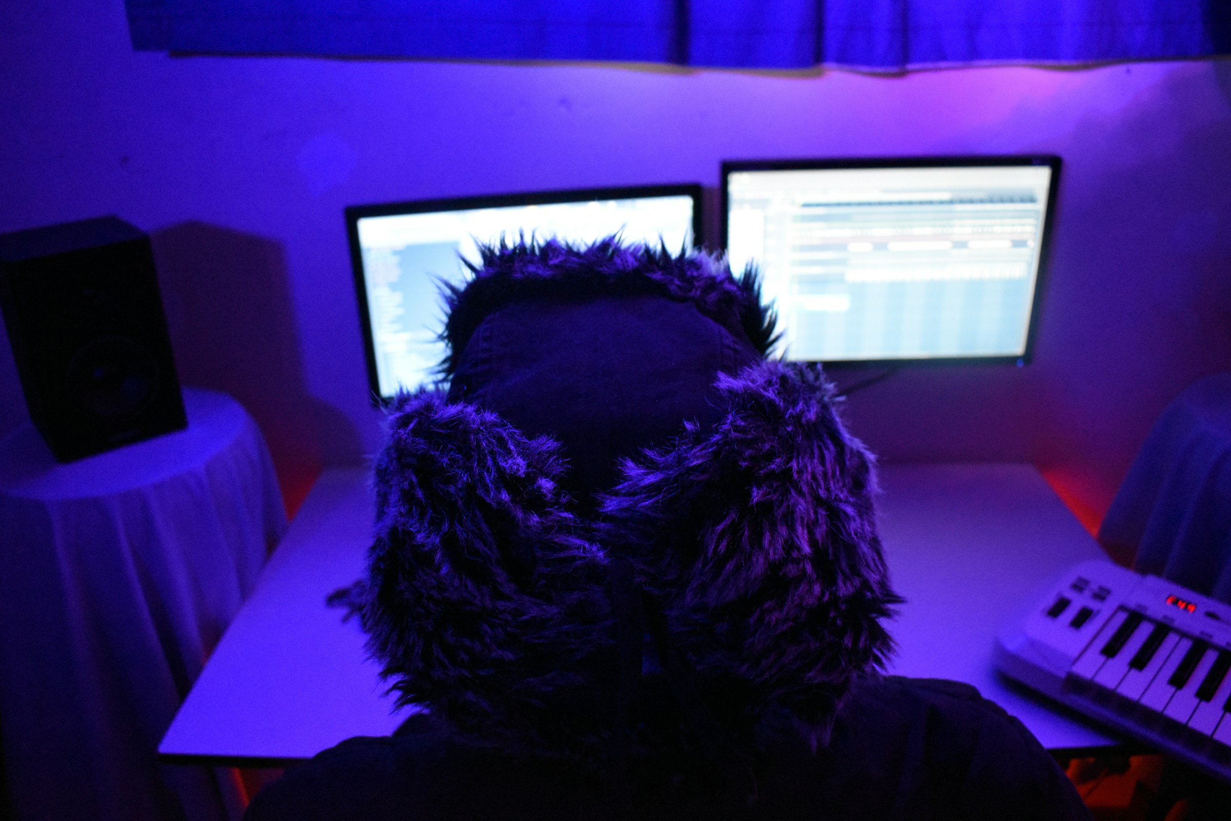 person working on new song - How To Make Rap Music