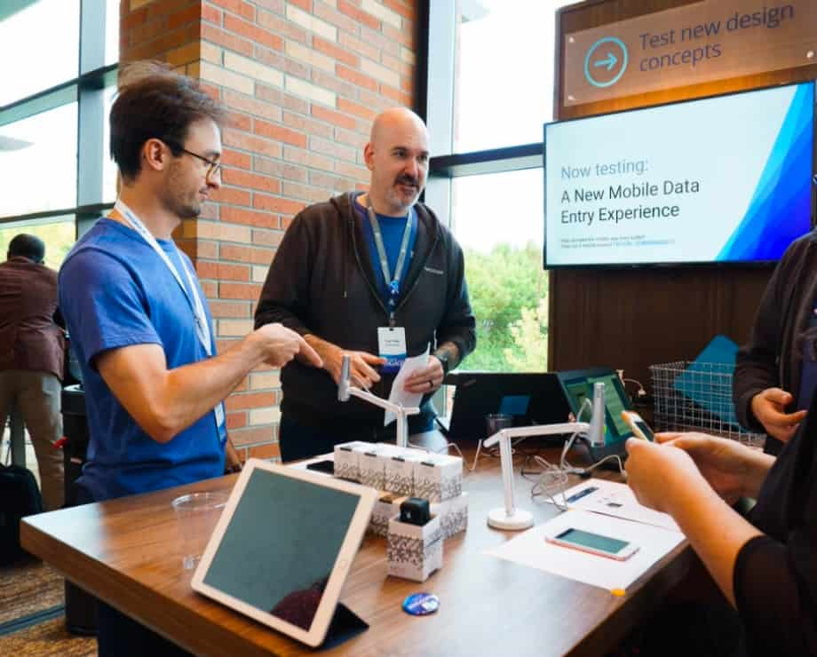 Conference booth with colleagues