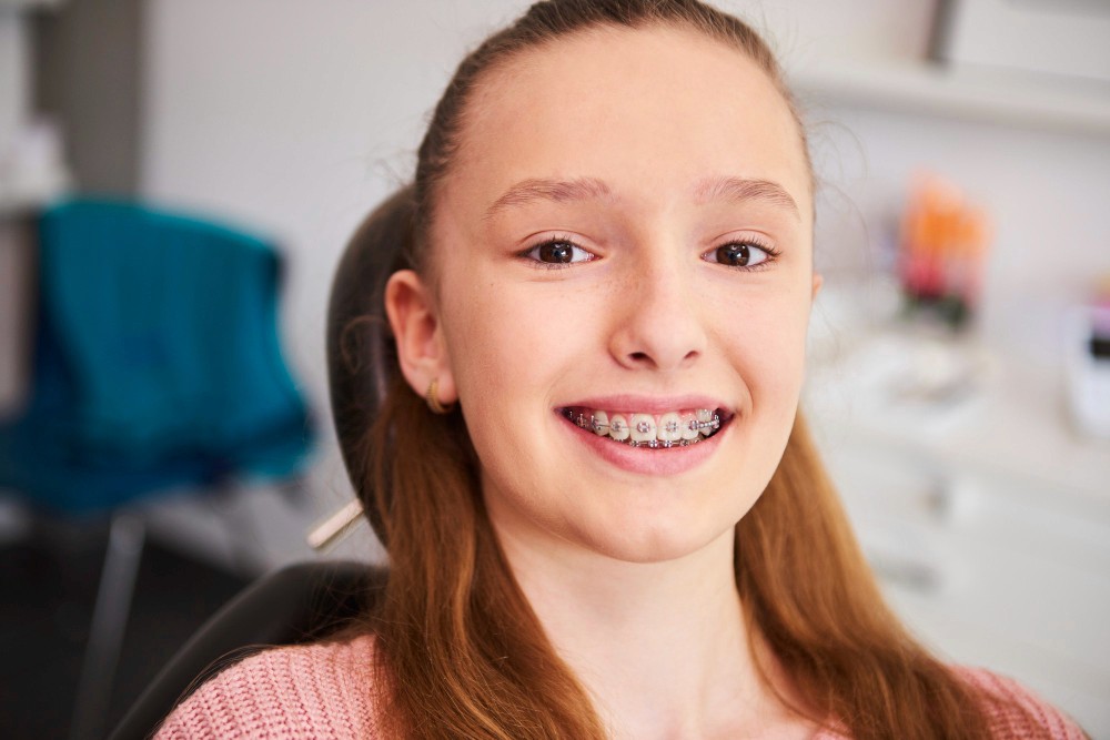 Female child sitting in a dentistry chair