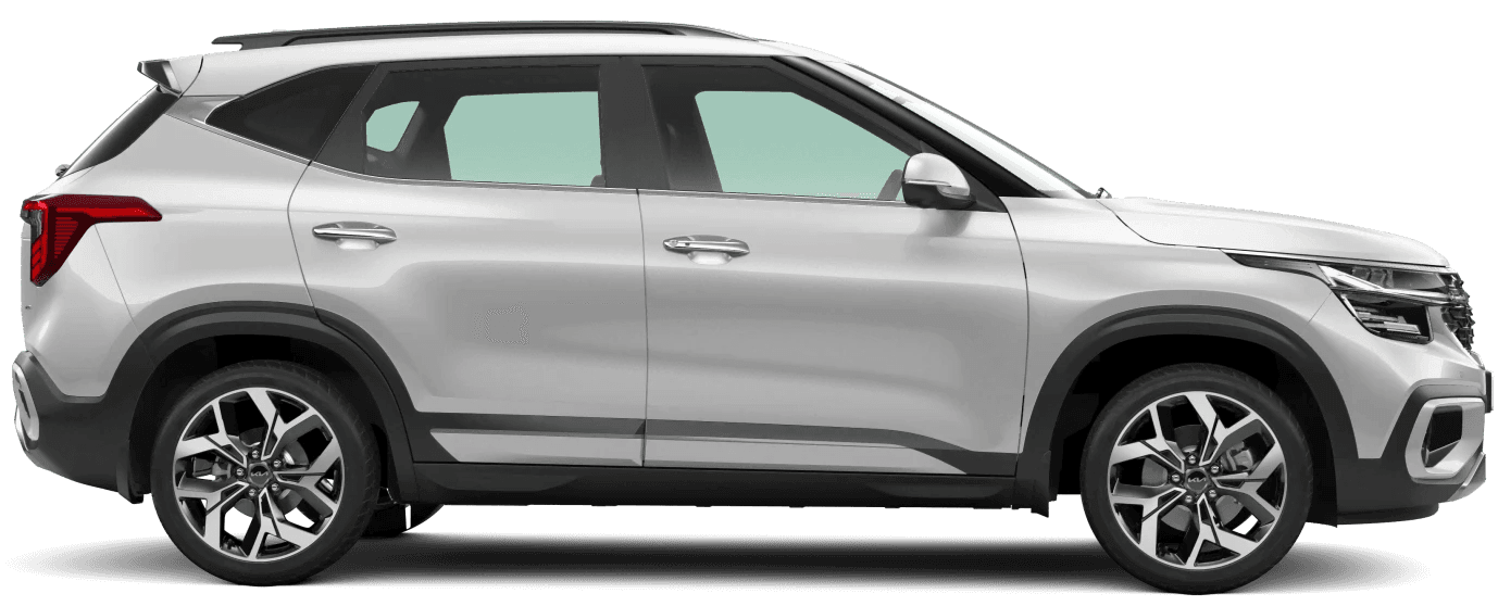 Side view of a modern silver SUV with stylish alloy wheels and sleek body lines, available for unlimited kilometers rental, isolated on a white background.