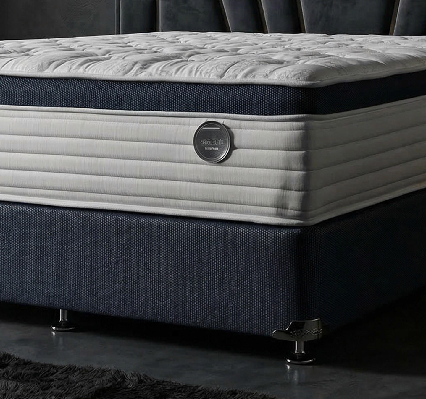 Minimalist workspace with natural stone columns, Scandinavian-style furniture, golden light, and greenery.