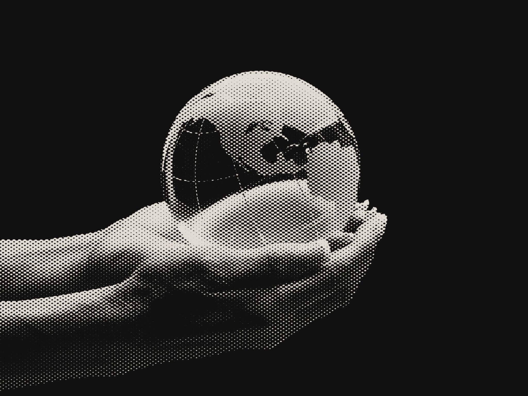 Hands holding a globe illustration, symbolizing Firgun Ventures’ core values of integrity, responsibility, and alignment with companies in the quantum technology ecosystem.
