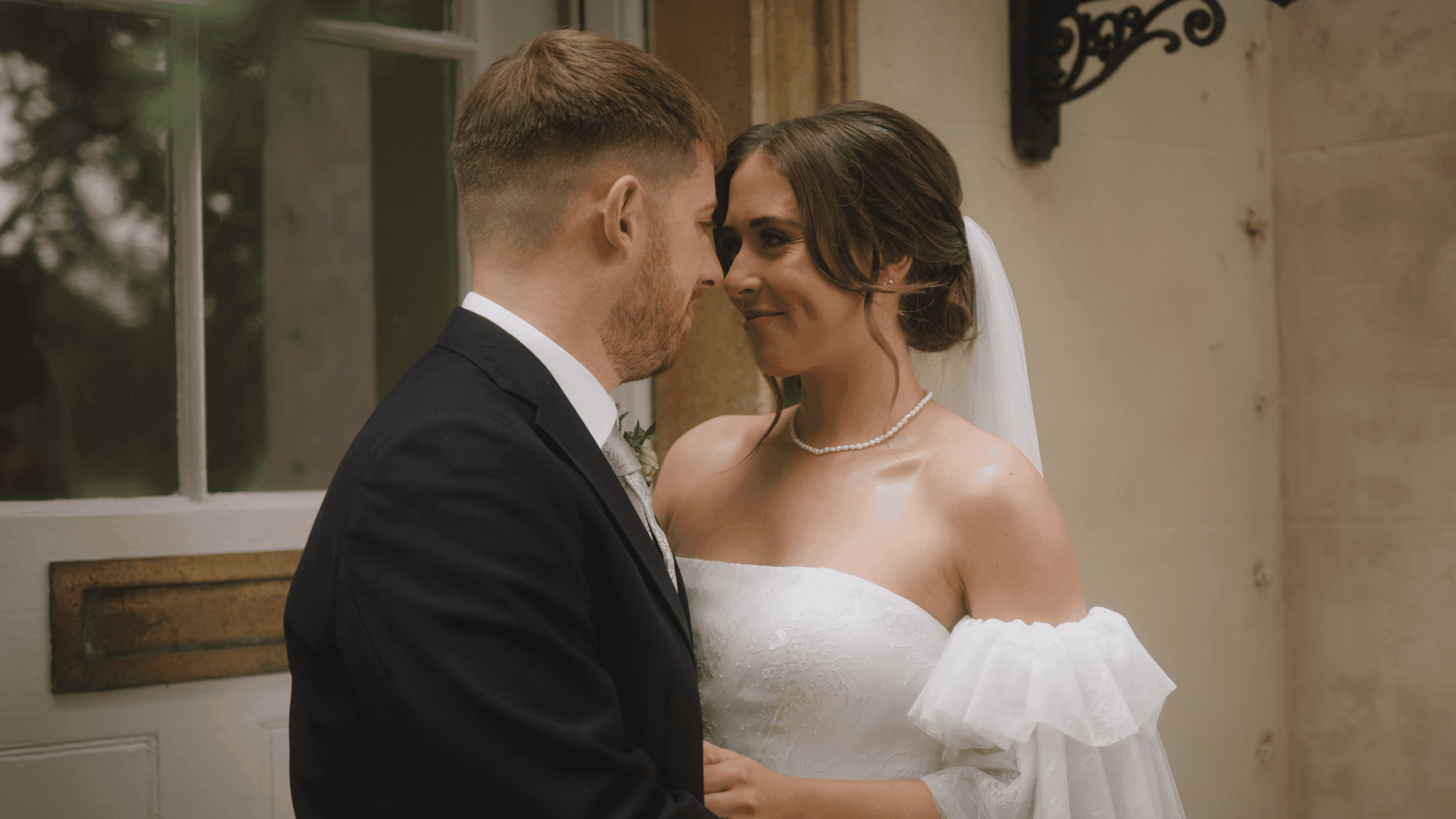 Bride and groom sharing a quiet moment together during wedding portraits at Aswarby Rectory in Lincolnshire