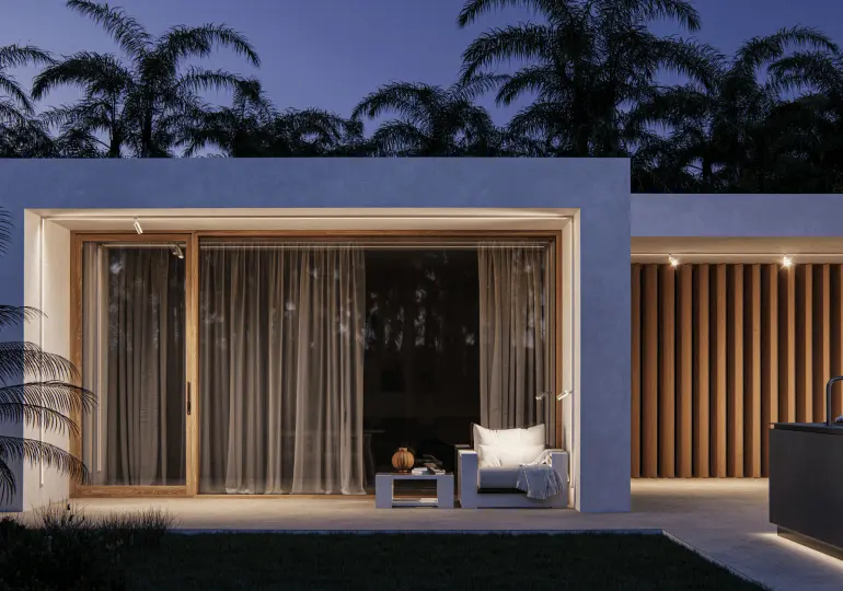 Iluminación exterior Beneito Faure con focos empotrados y luz perimetral en vivienda moderna