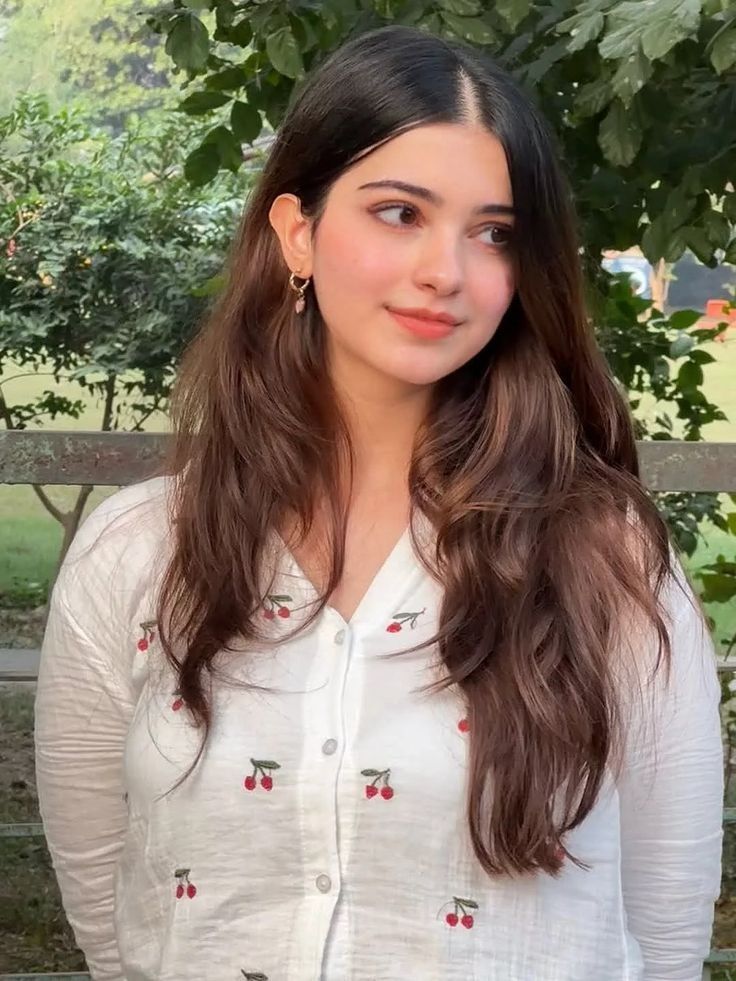 kids lying on a glass land and smiling