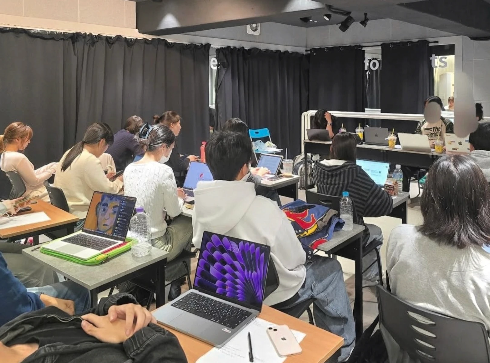 Lone pine tree on snowy hill at sunrise