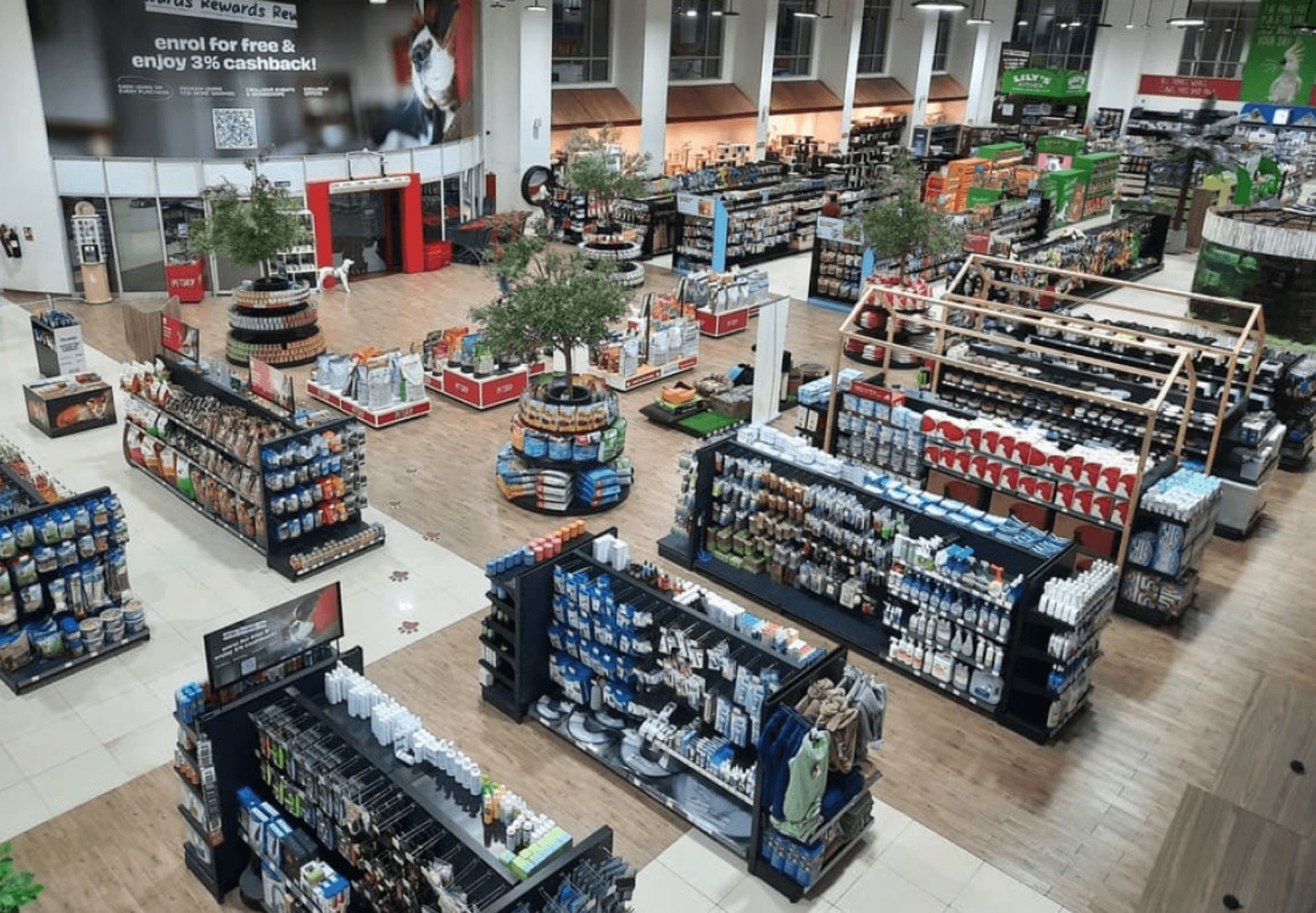 A top view of the ground floor of the The Pet Shop, with numerous shelves and rows of pet products.