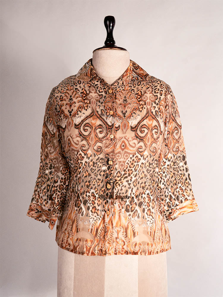 Vintage mixed animal print blouse with 3/4 sleeves.