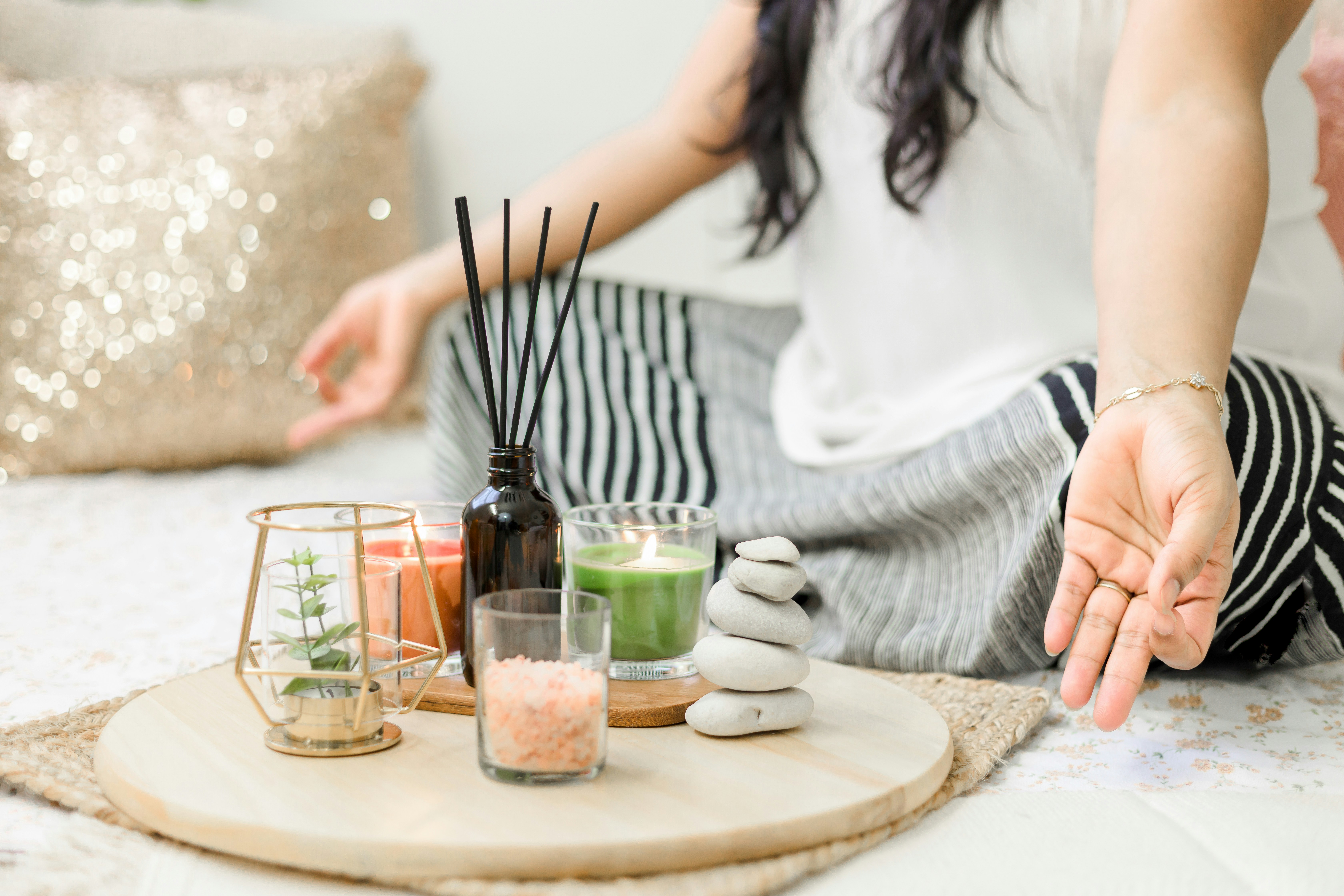 a woman doing a therapy session with some natural products for peaceful mind