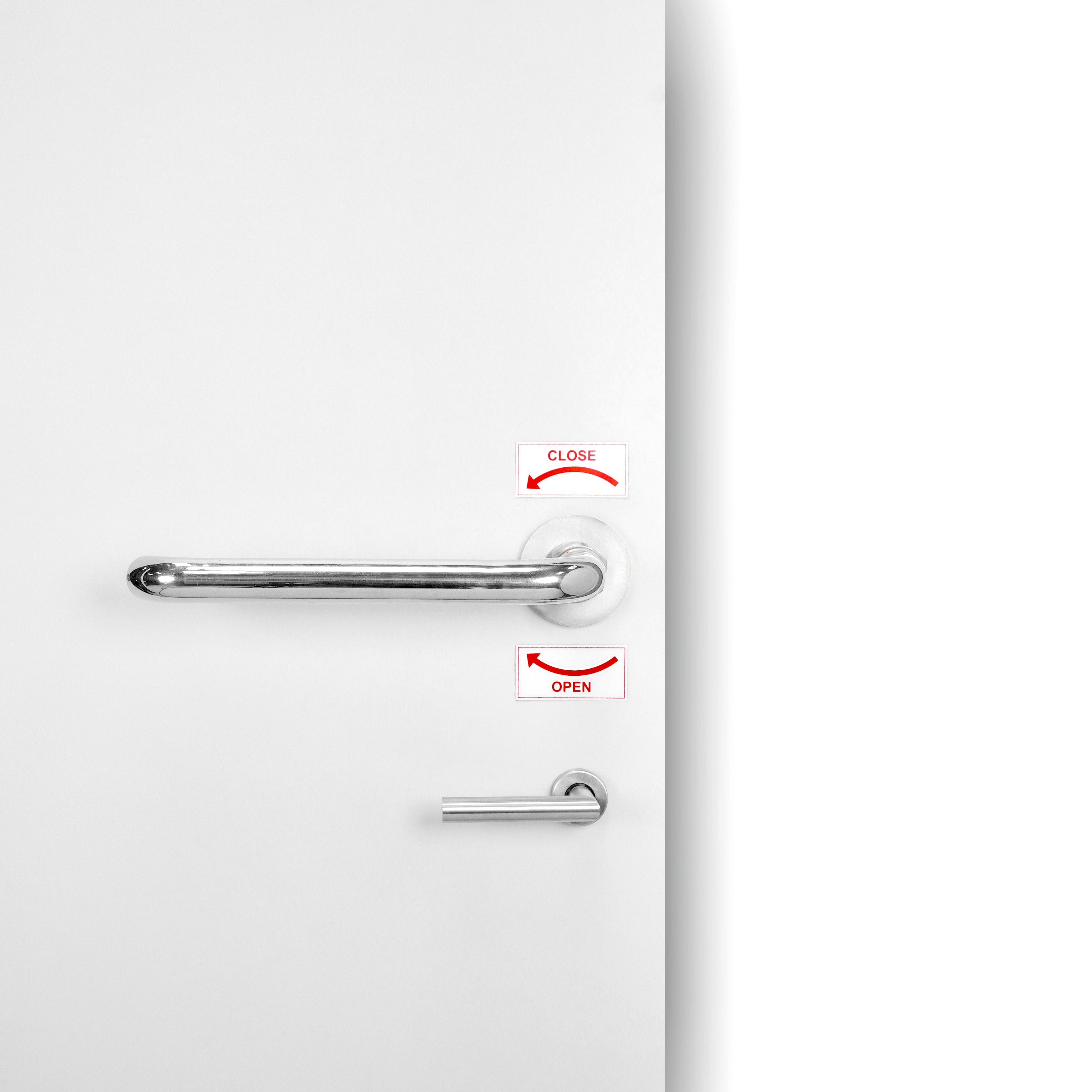 Close-up of a dark green leaf showing its textured surface and central vein against a muted background.