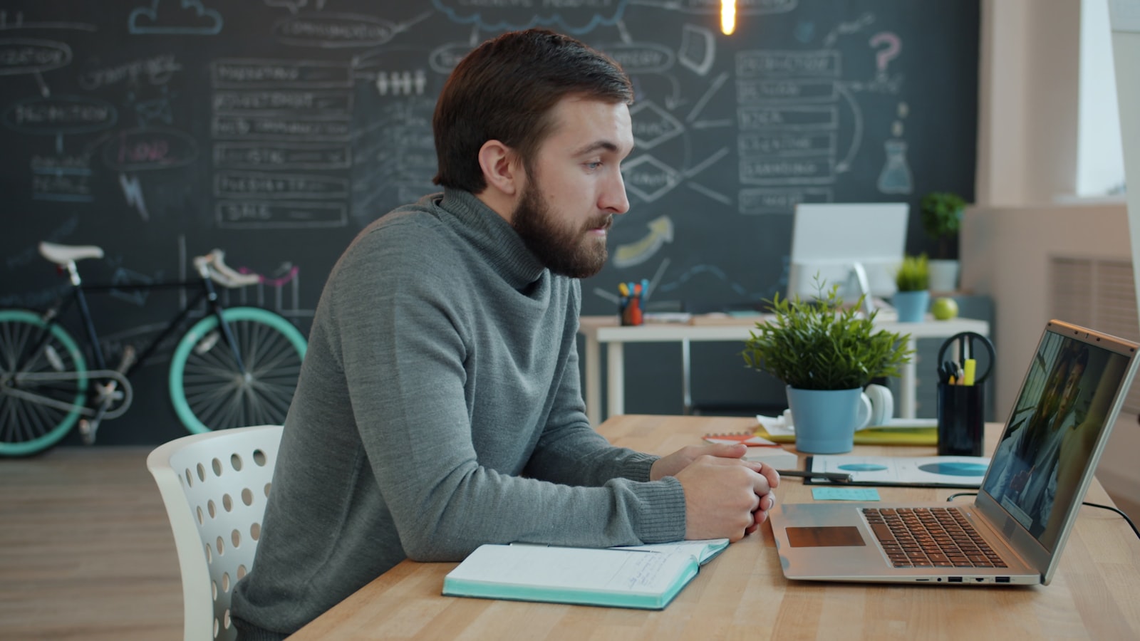 Microsoft 365 security settings checklist on a business laptop.
