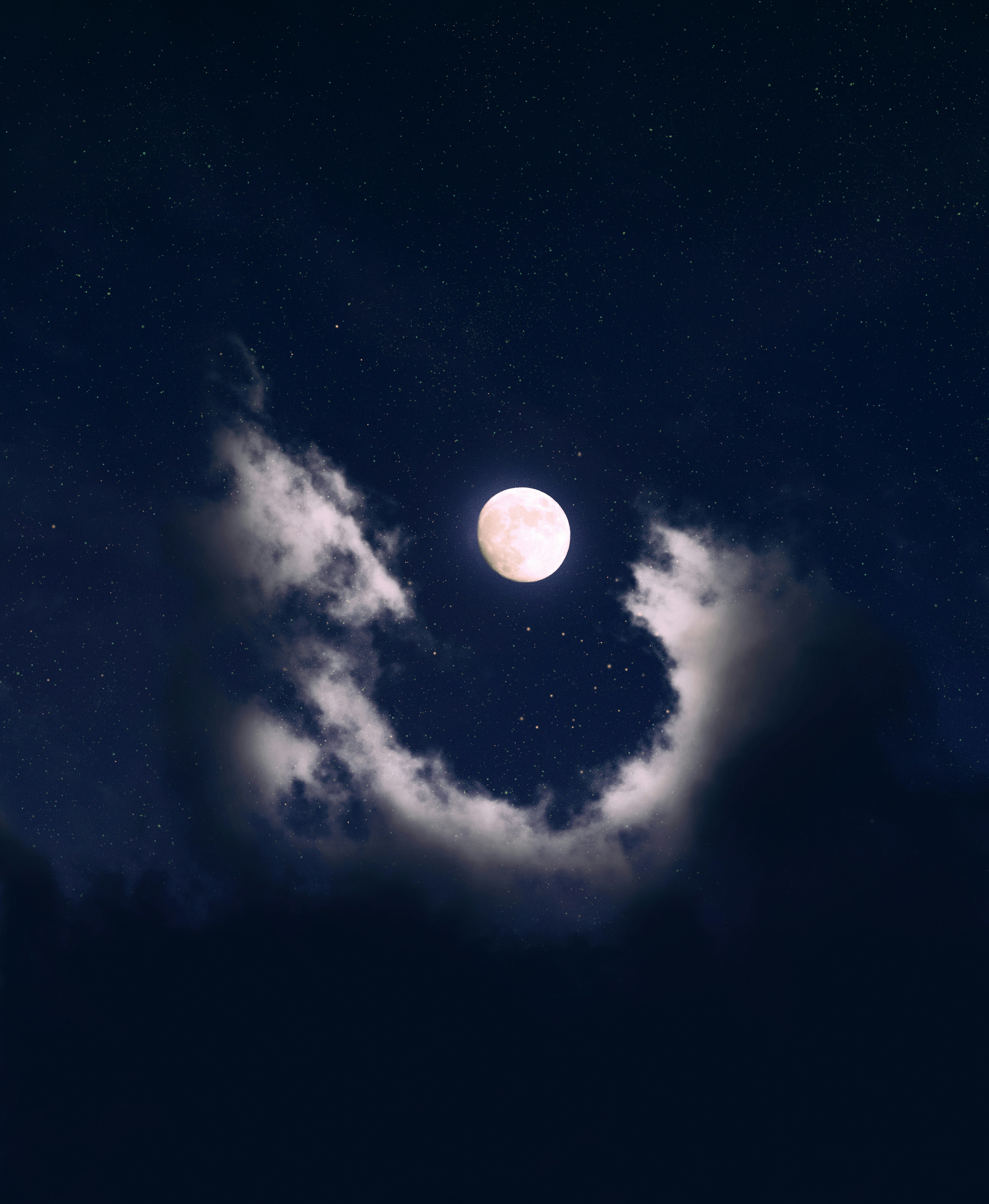 full moon covered by clouds