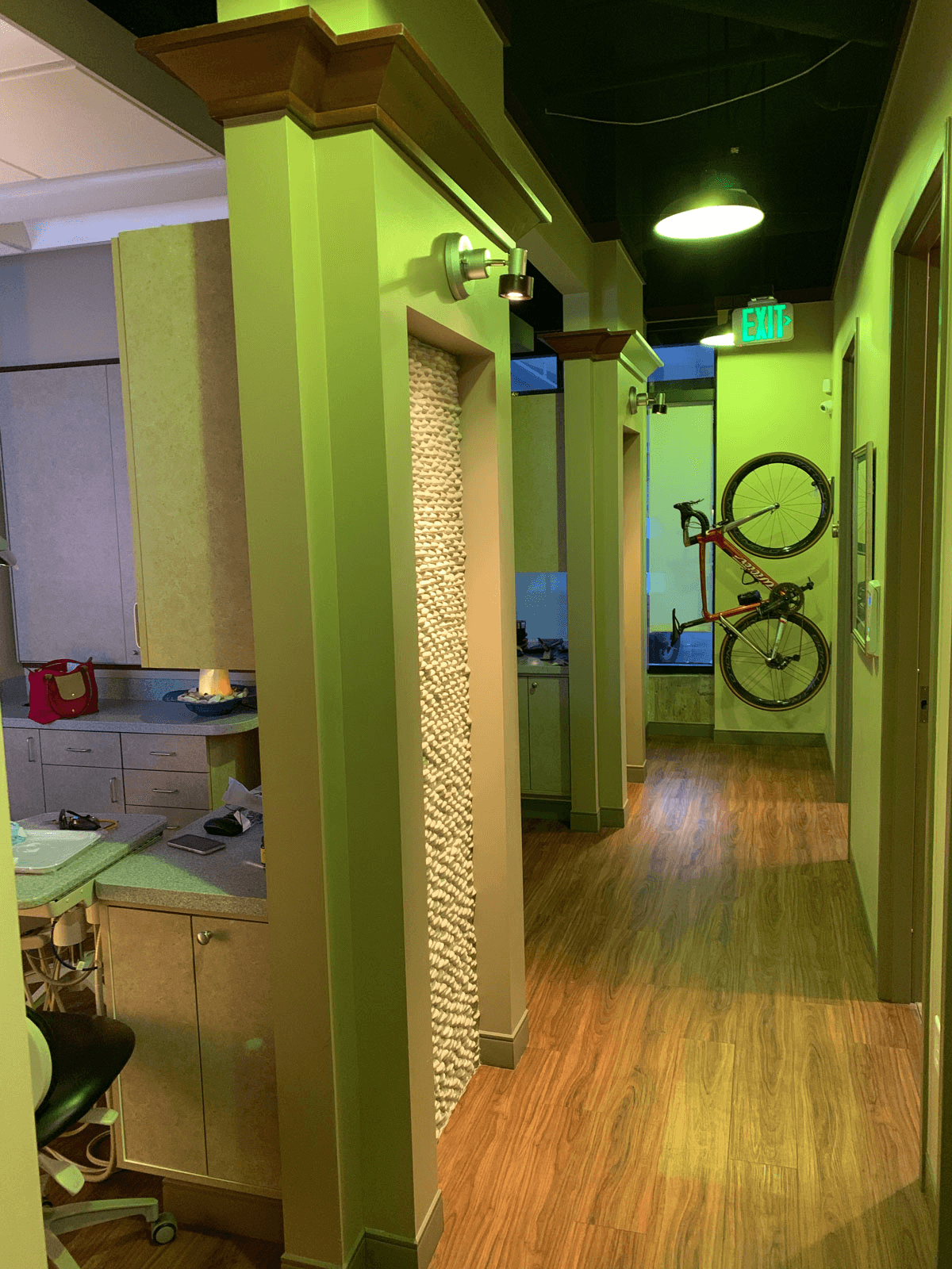 Boulder dental arts interior hallway with bicycle mounted to wall