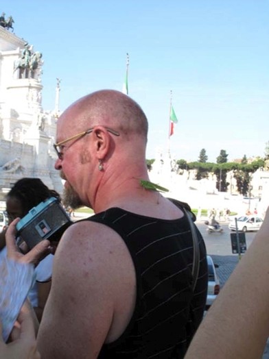 a man with a Grasshopper on his neck