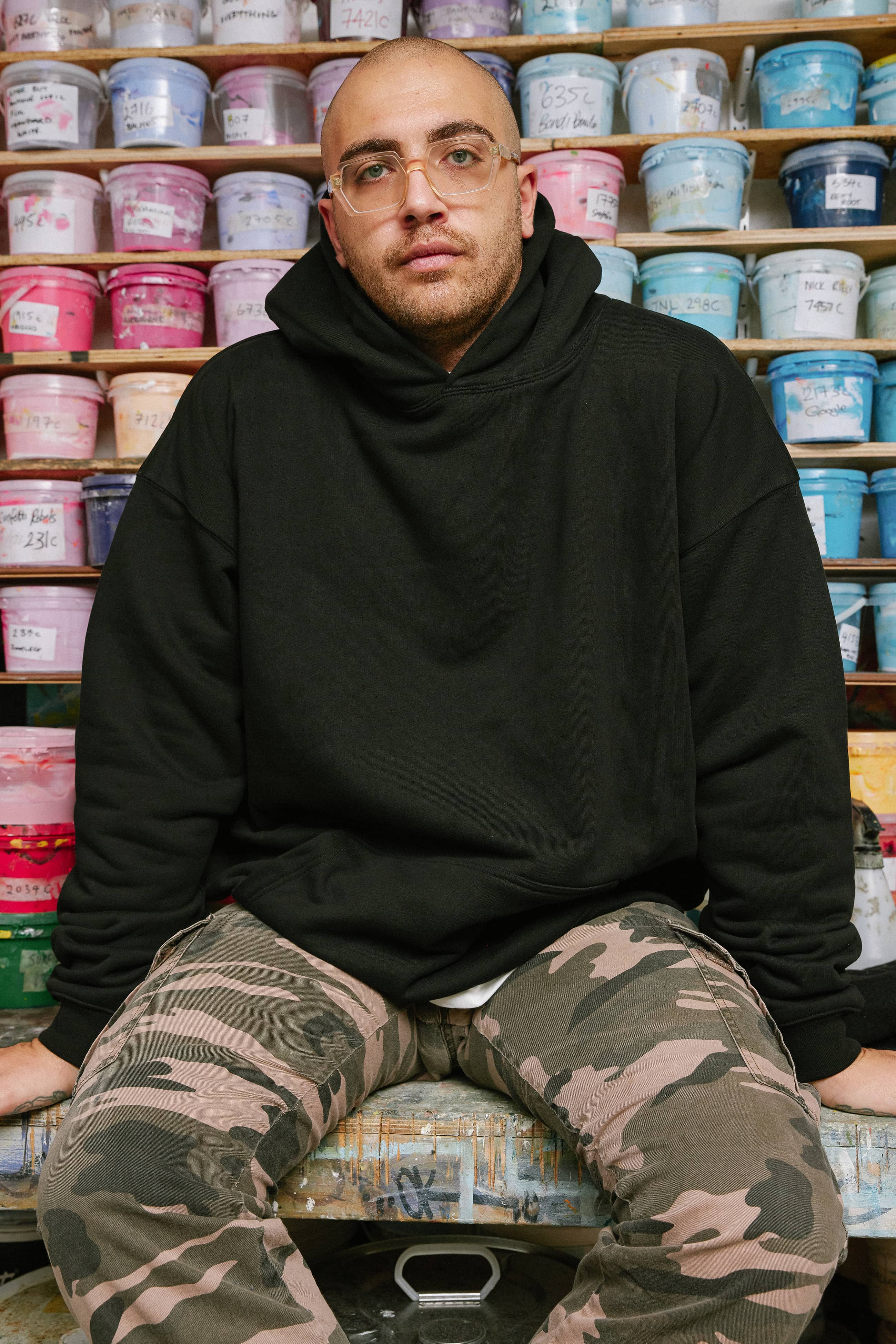 Man facing brick wall