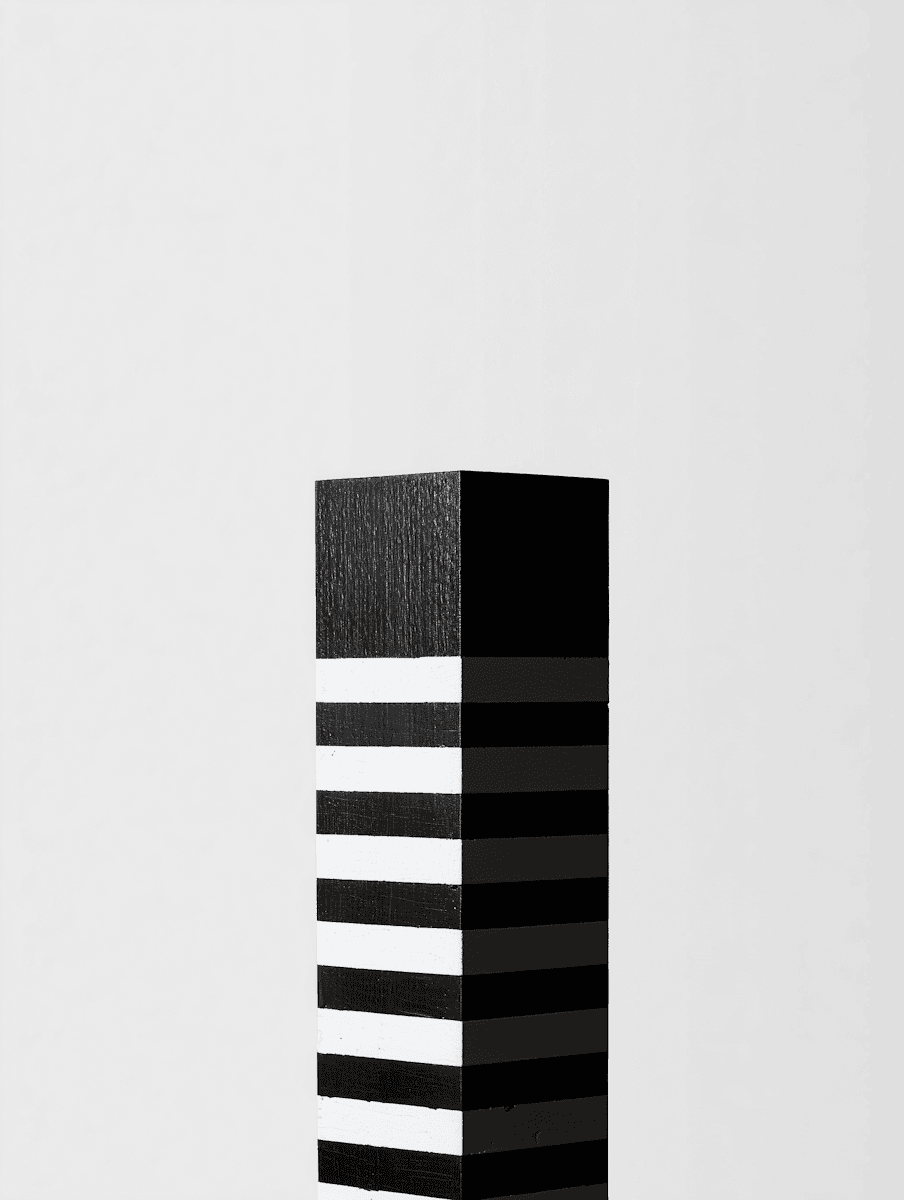 Minimalist black rectangular column with horizontal white stripes, standing against a clean light gray background.