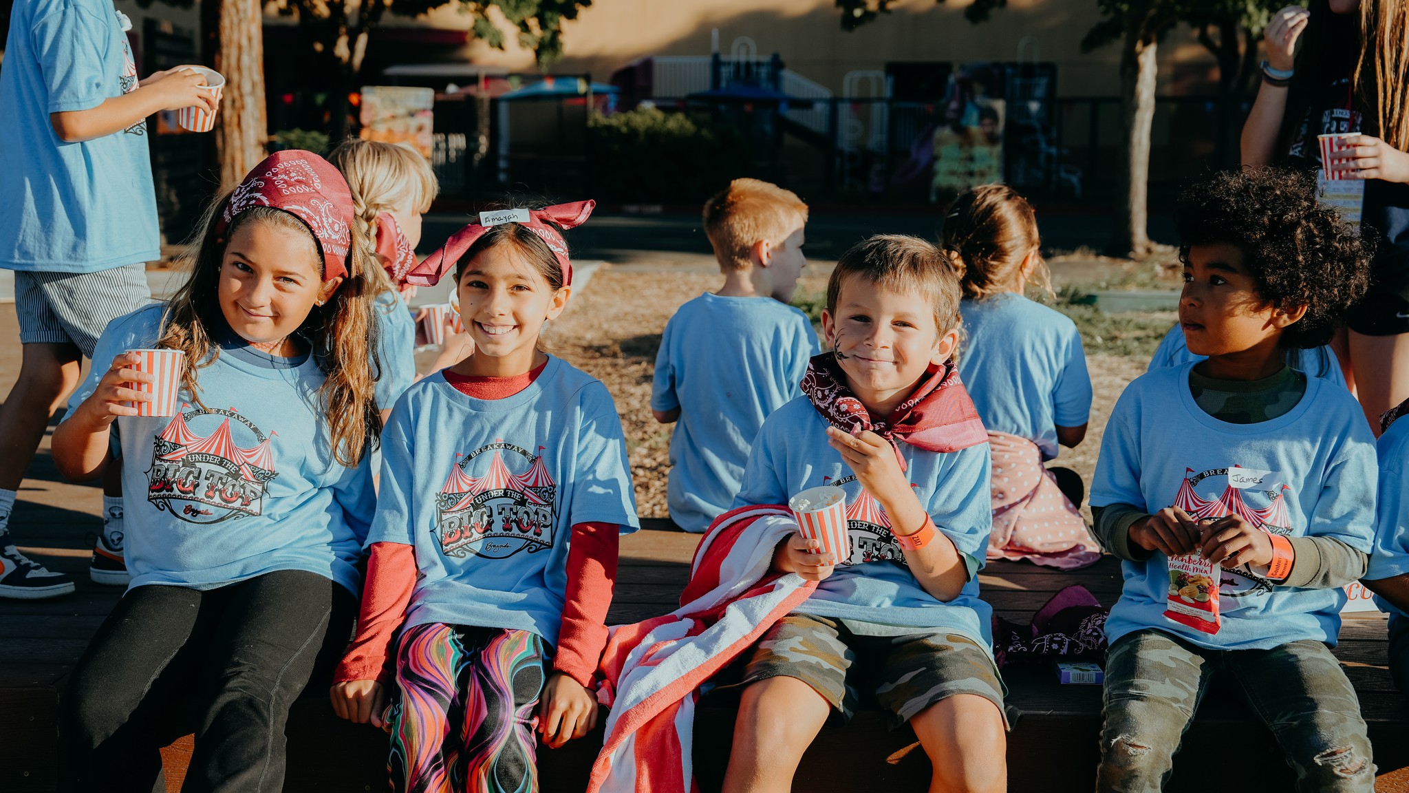 husband and wife working happily on a laptop