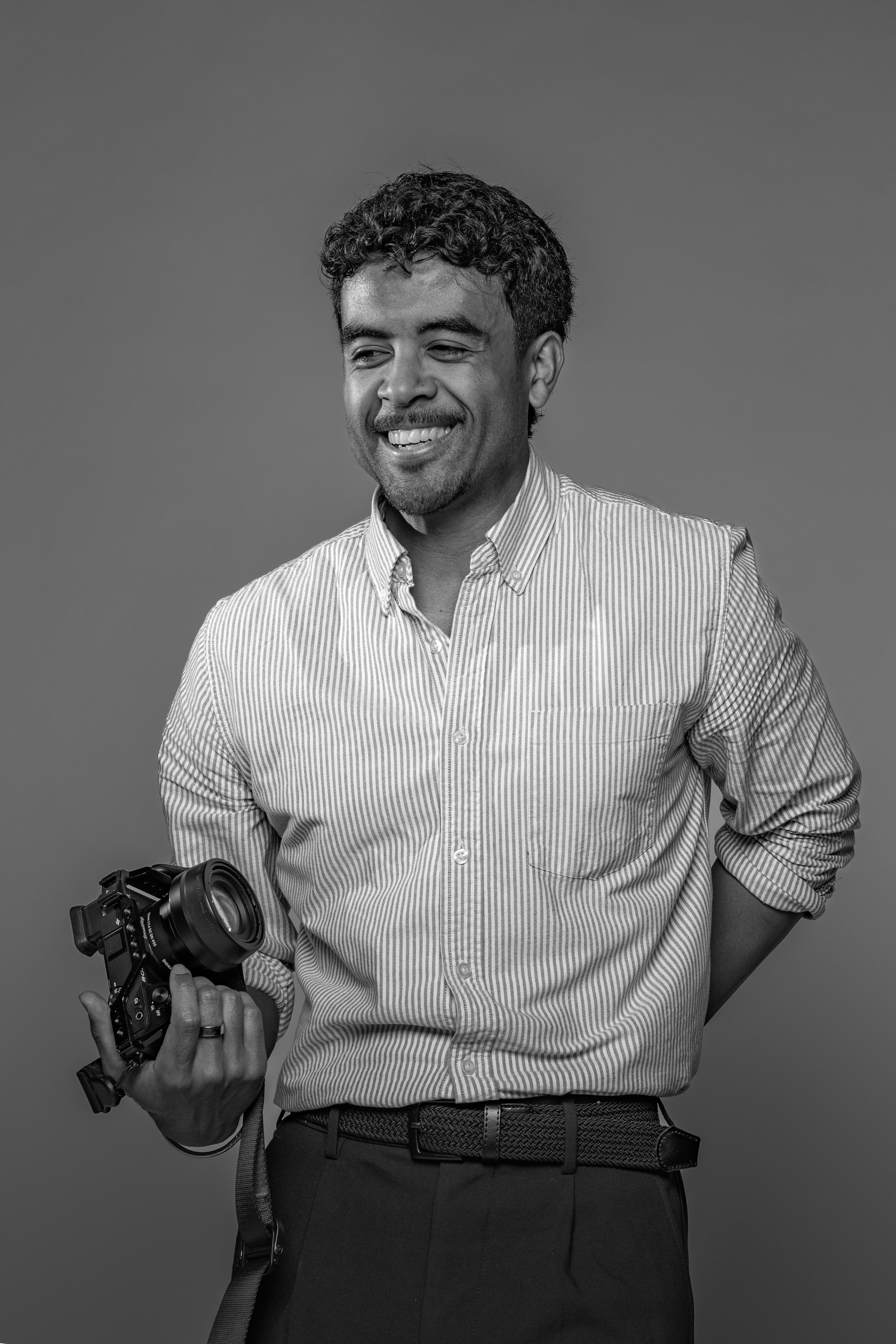 Photographer holding camera
