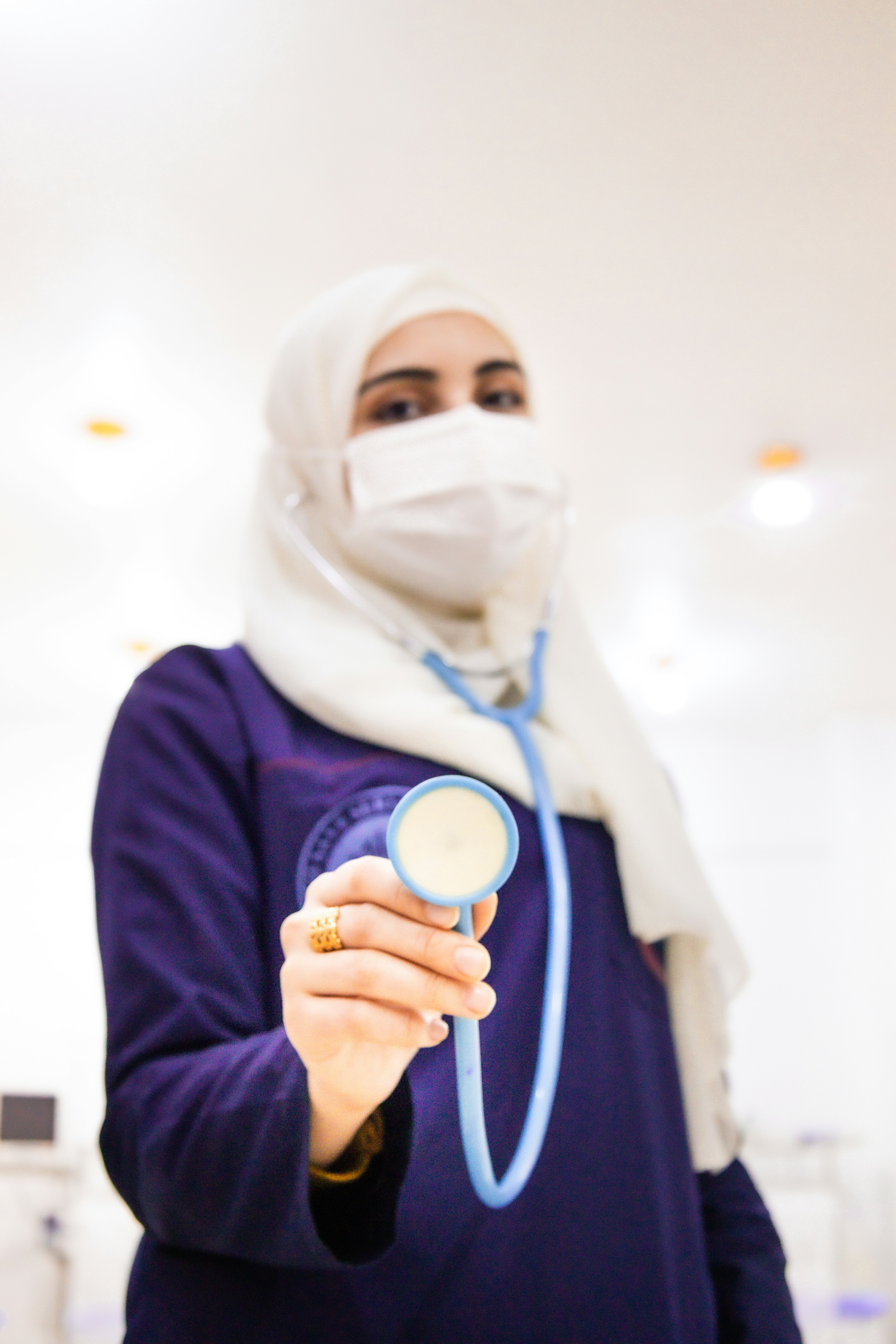 A healthcare professional with a stethoscope.