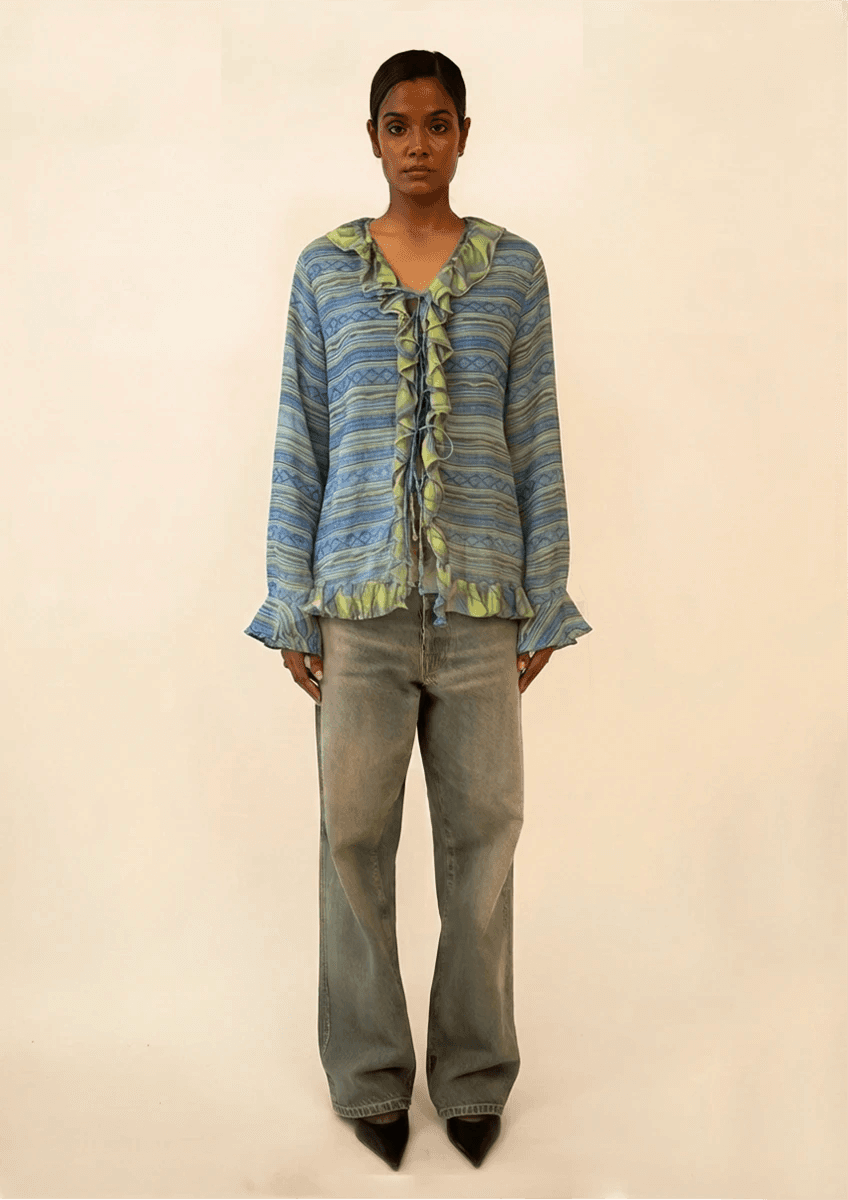 SANJH is a one of a kind front open top, handcrafted in house from printed pure silk.