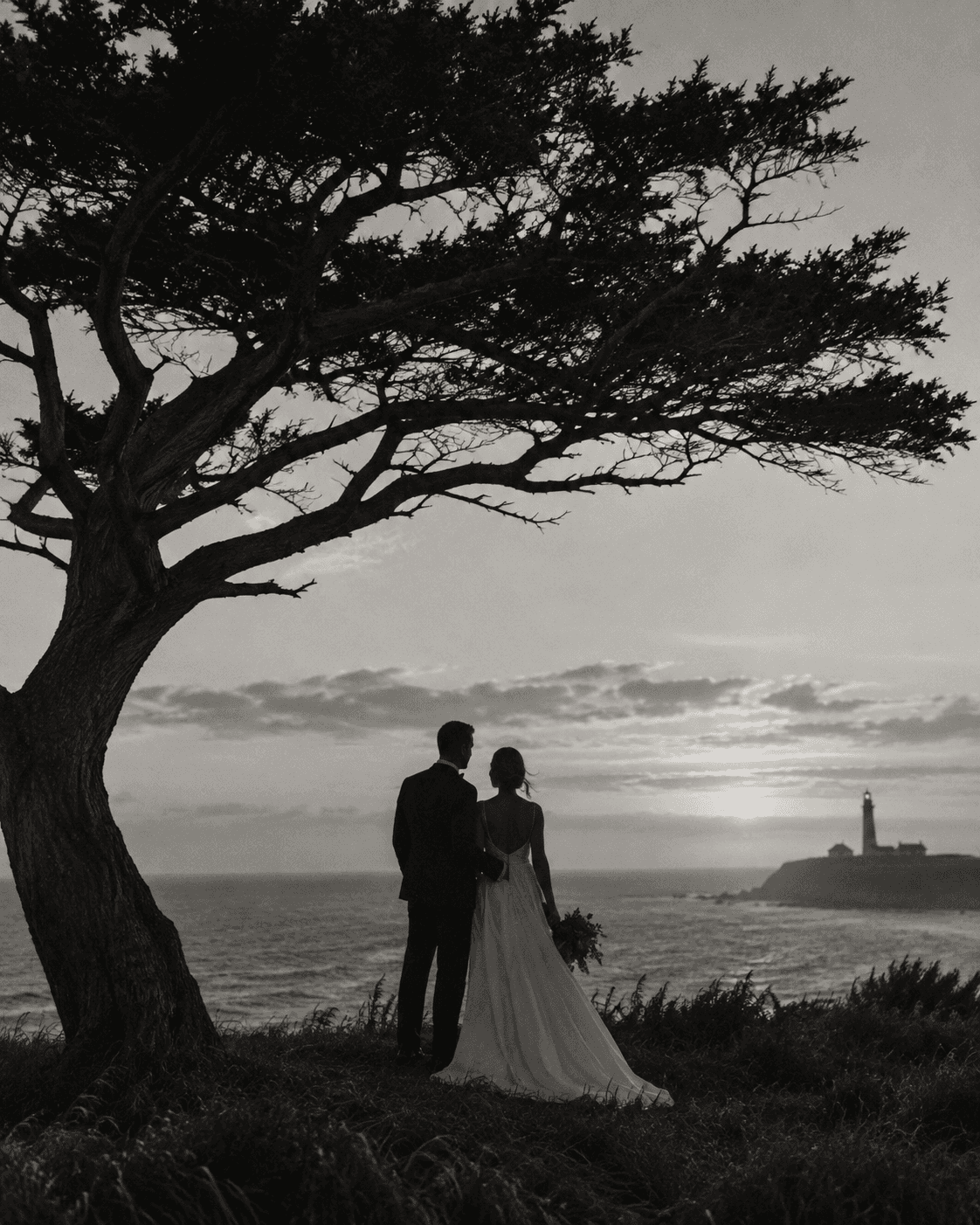 Newlyweds beneath a windswept tree near the Montauk lighthouse