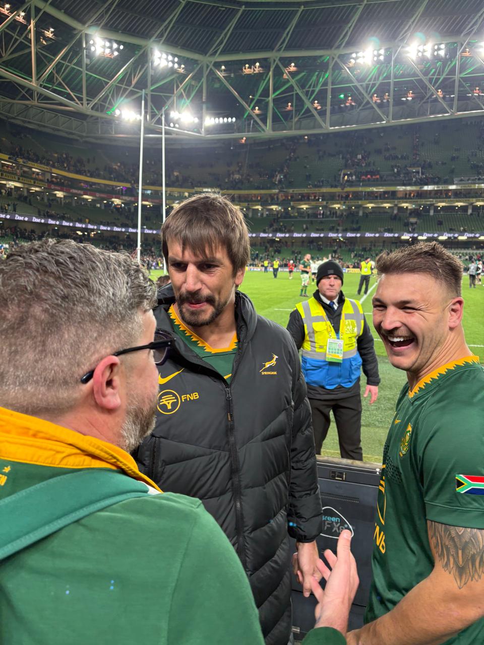 Image of eben etzebeth on stage at an eventra group event