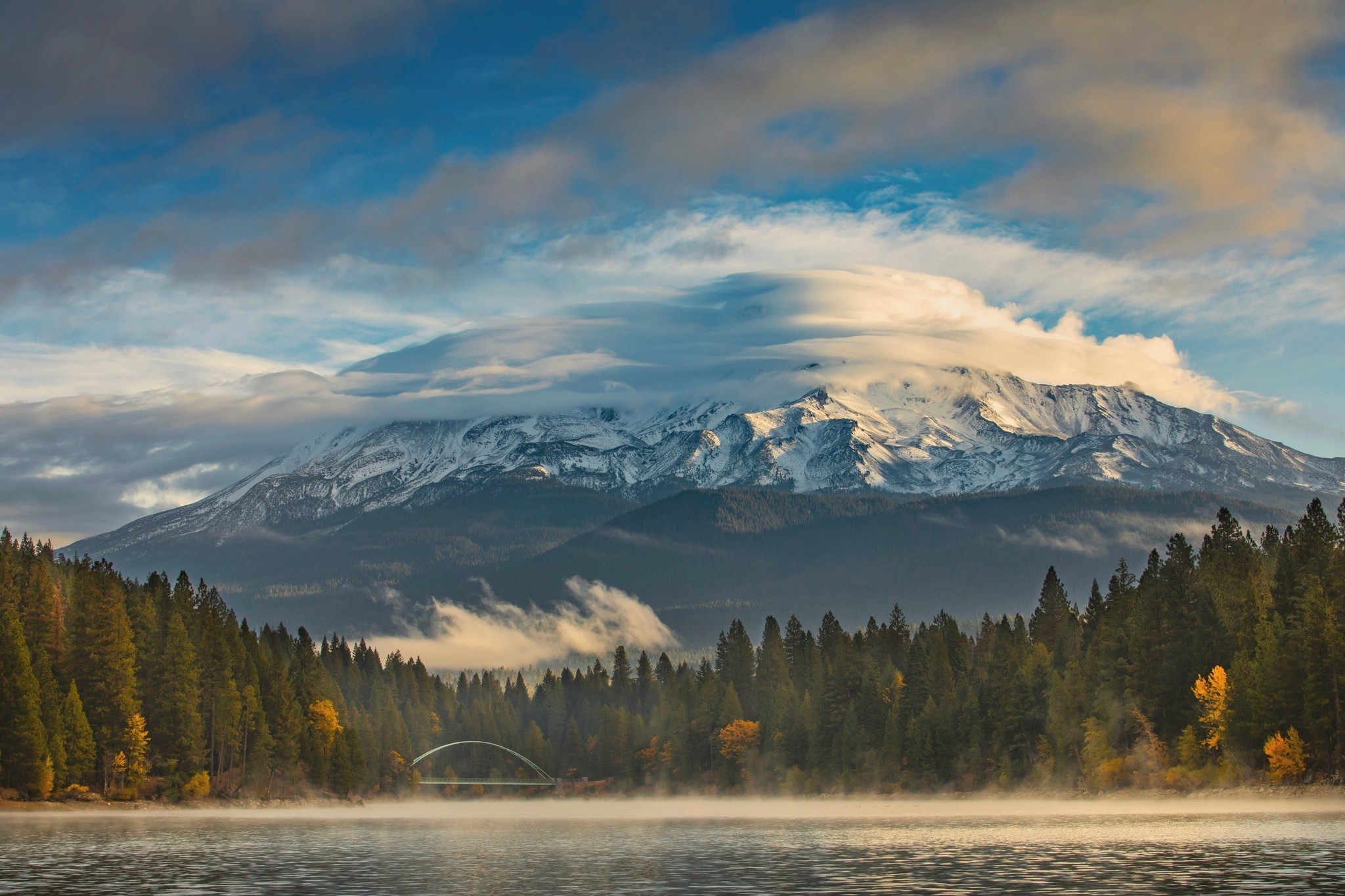 Clouds rolling over a snow-capped Mt Shasta.