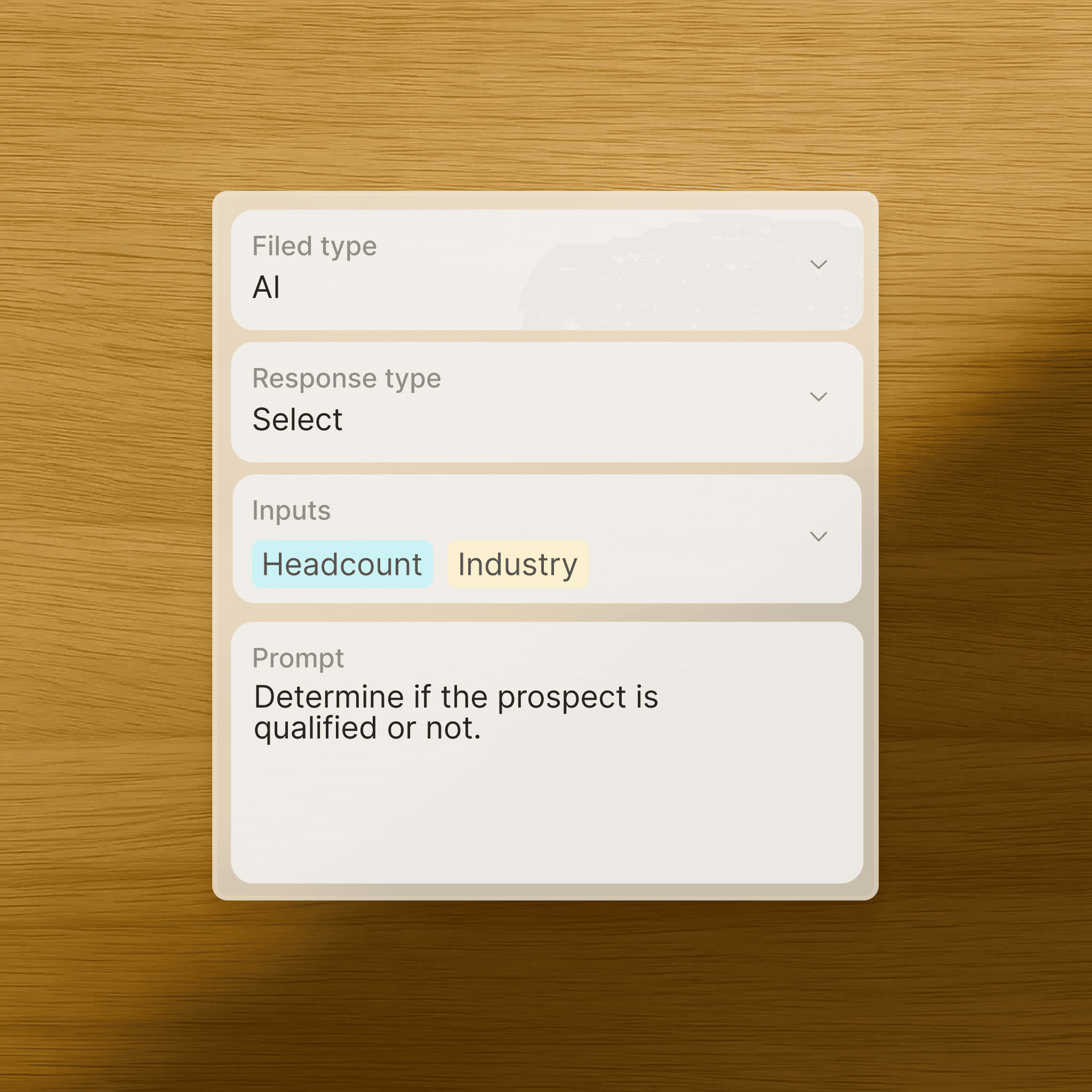 Man and woman standing together at a desk with a laptop and notebooks, smiling at the camera.