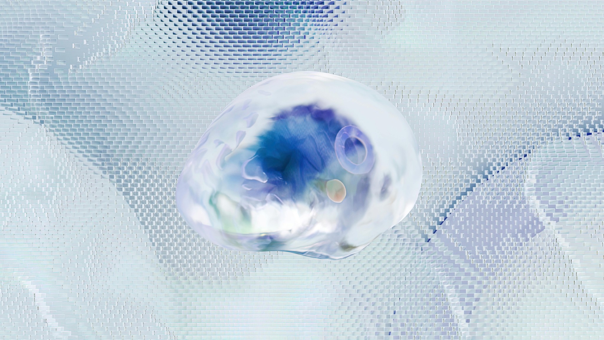 Close-up of a clear water droplet on a soft, white surface, reflecting shades of blue and light.