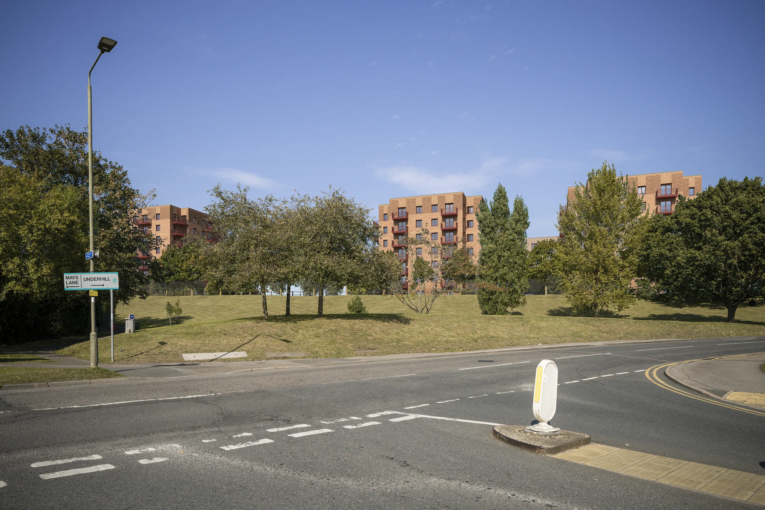 Type 4 AVR Level 3 verified view due north from the junction of Barnet Lane and Mays Hill, across Barnet Hill Open Space, showing Buildings B, C and D between and above the foreground trees.