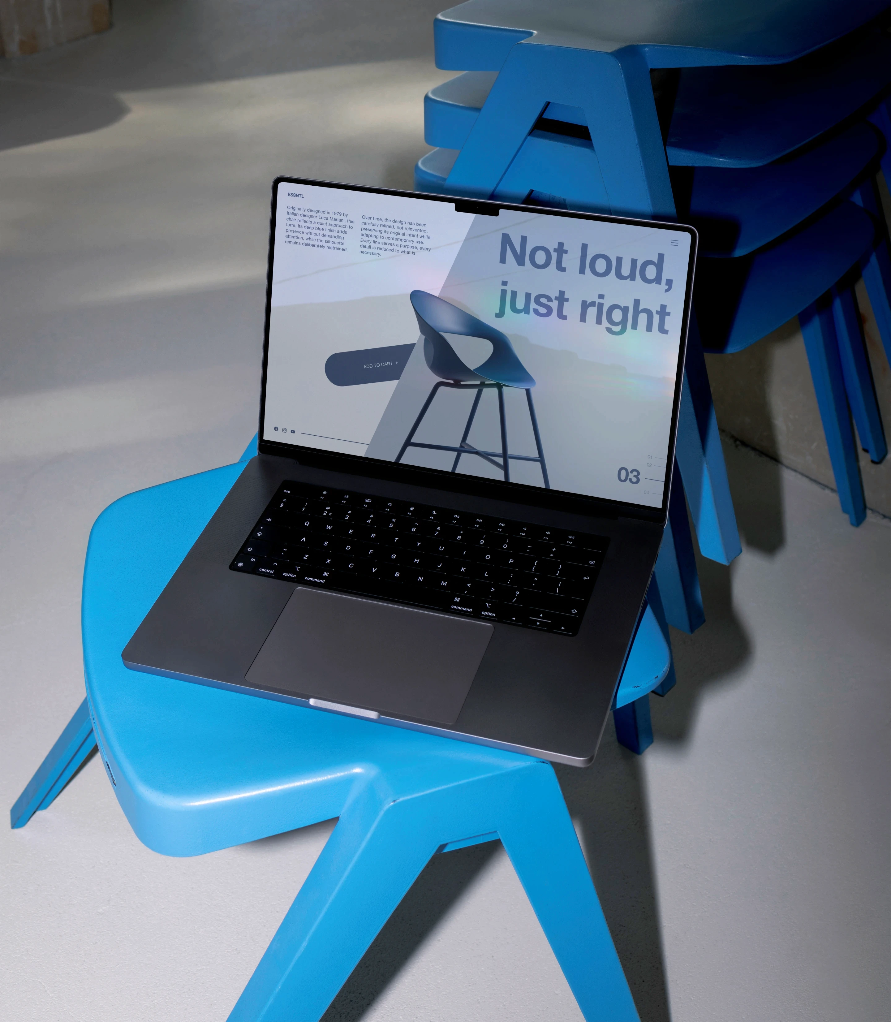 The website presented in a MacBook mockup.