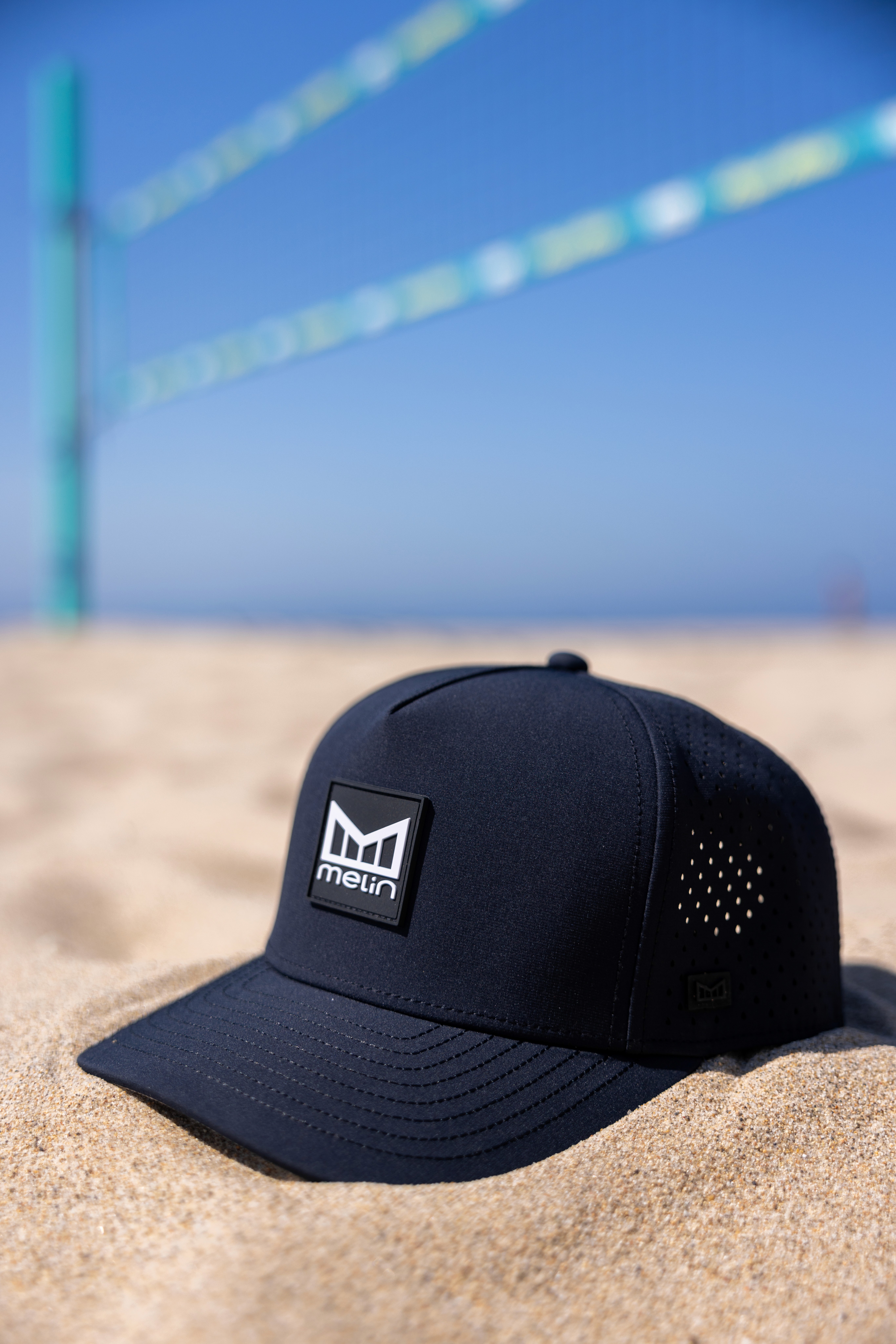 melin hat on beach