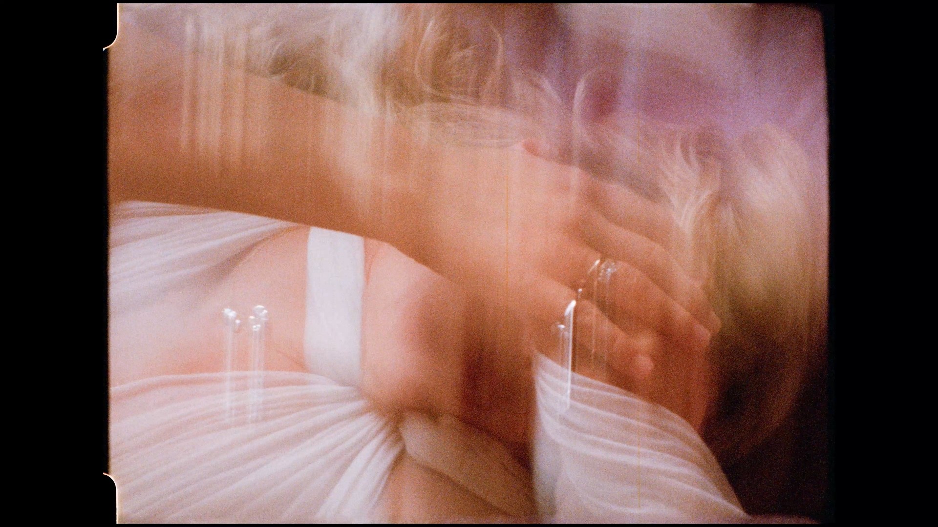 girl covering her face, blurred image, jewelry advertisement