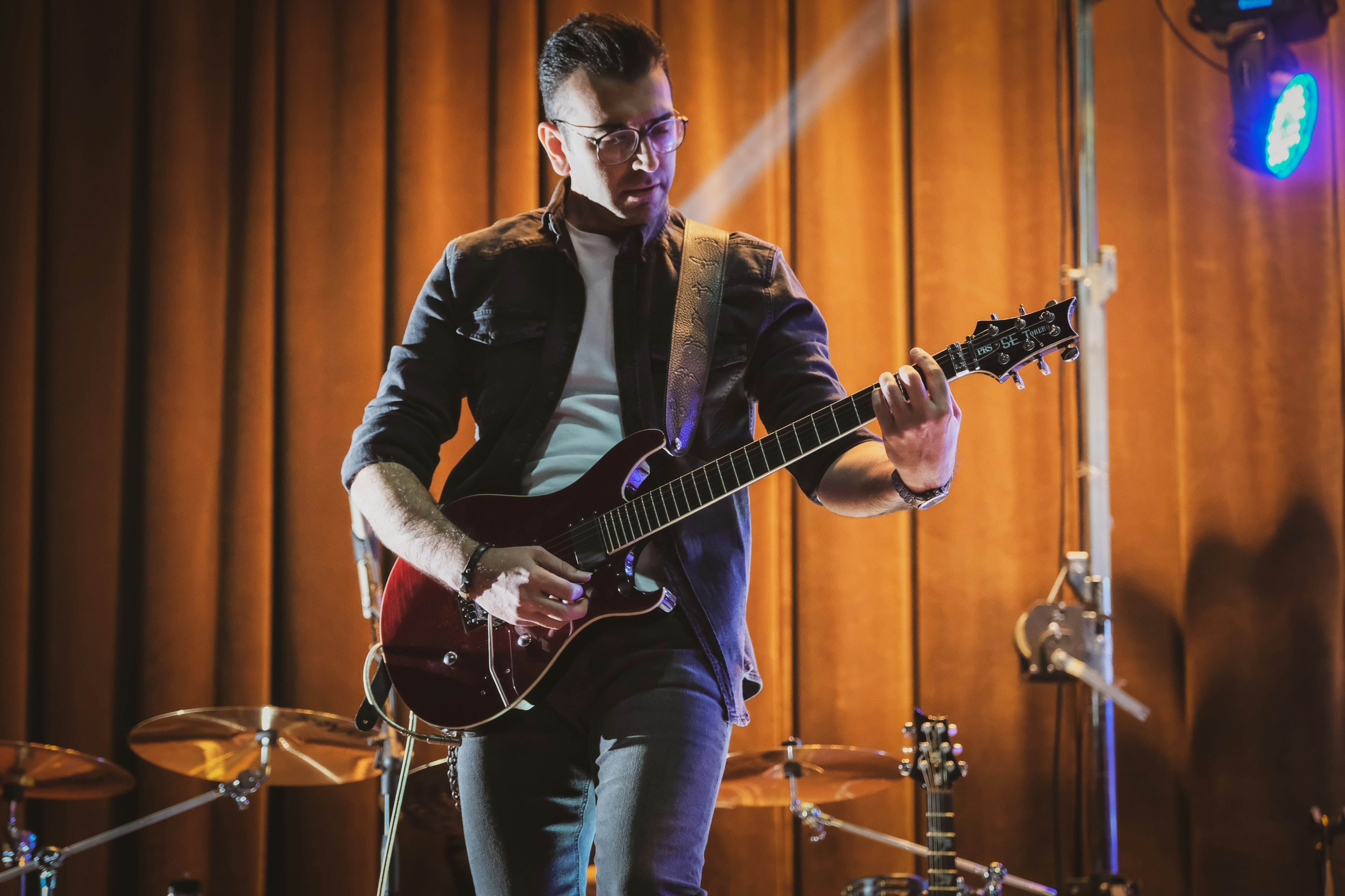 guy playing guitar 