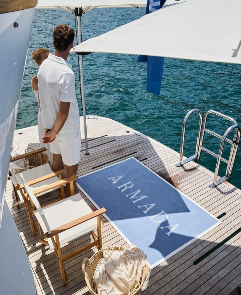 superyacht welcoming guests, private members club