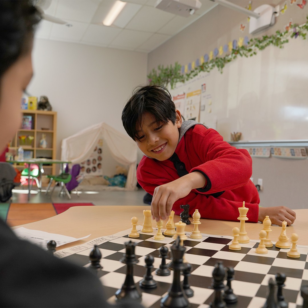 Middle school students developing critical thinking through guided chess activities