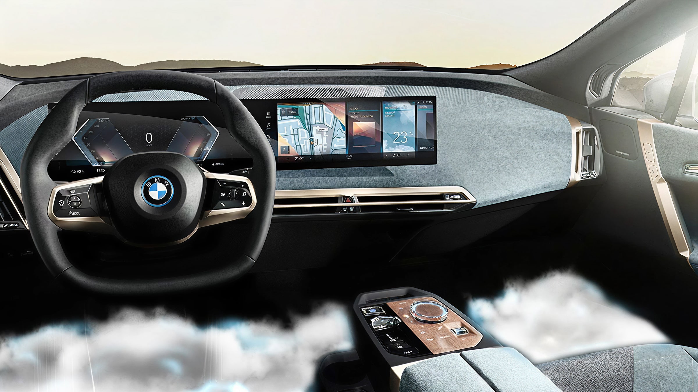 BMW iX interior with curved display showing navigation and cloud-like visual effect across the lower cabin