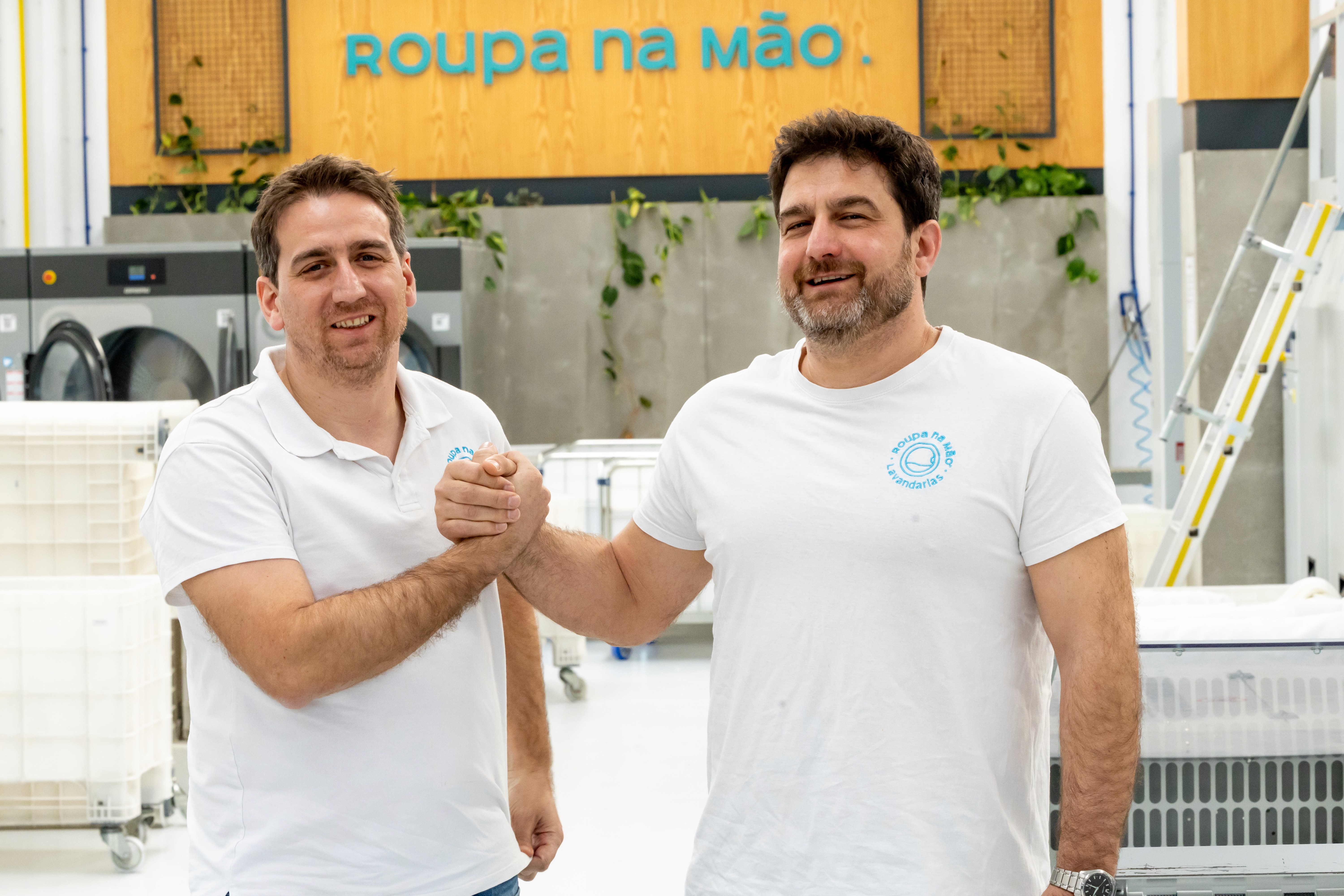 people sitting on chair in front of laptop computers