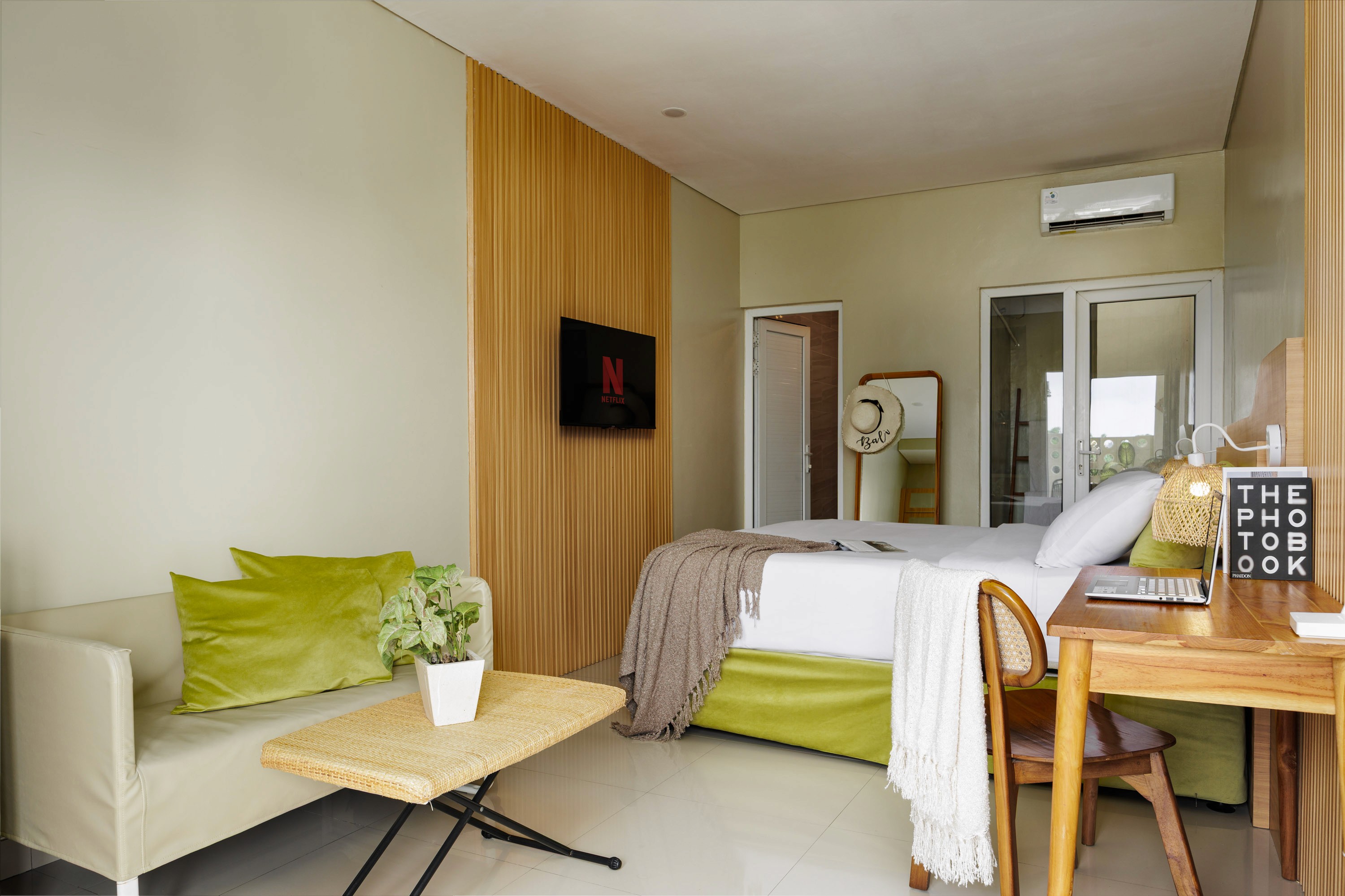 “Clean and calm apartment bedroom with modern wooden panel”